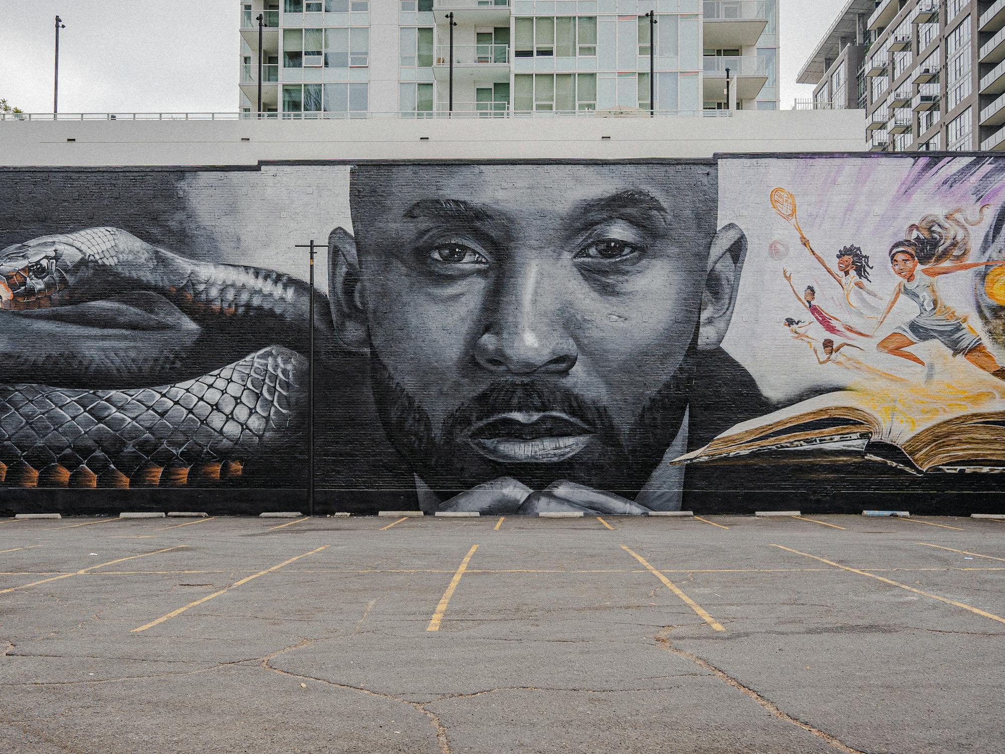 A large mural of Kobe Bryant on a wall in downtown Los Angeles
