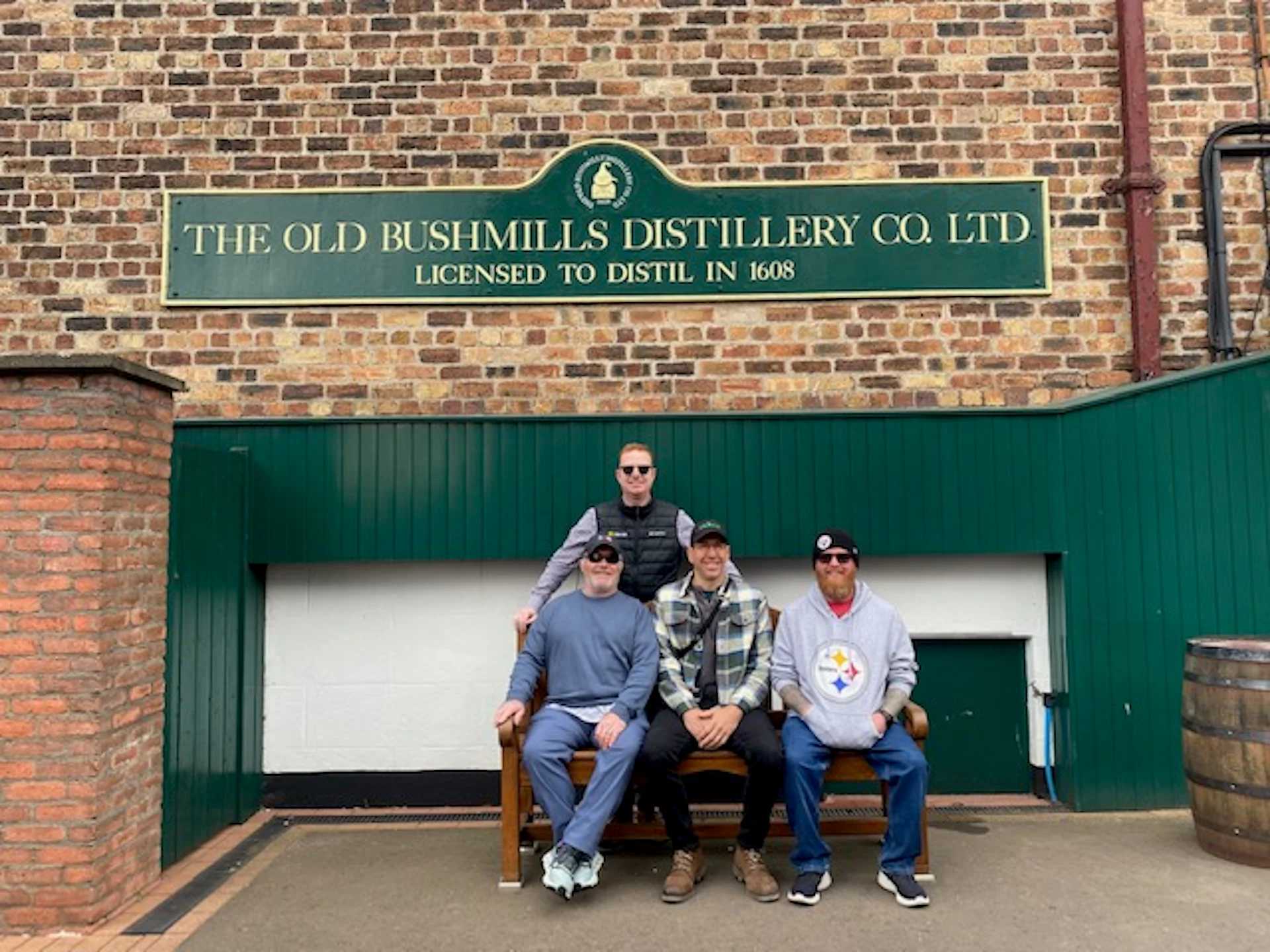 A group of visitors with Ireland Whiskey Tours enjoying Bushmills Distillery