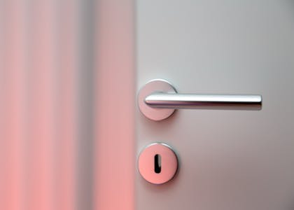 An image of a silver door handle