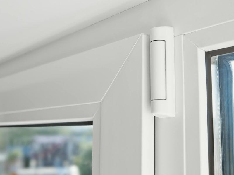 An image of a hinge on a uPVC door