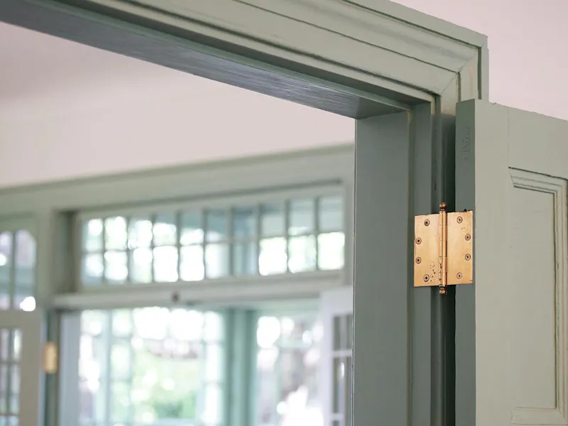 An image of a hinge of a door