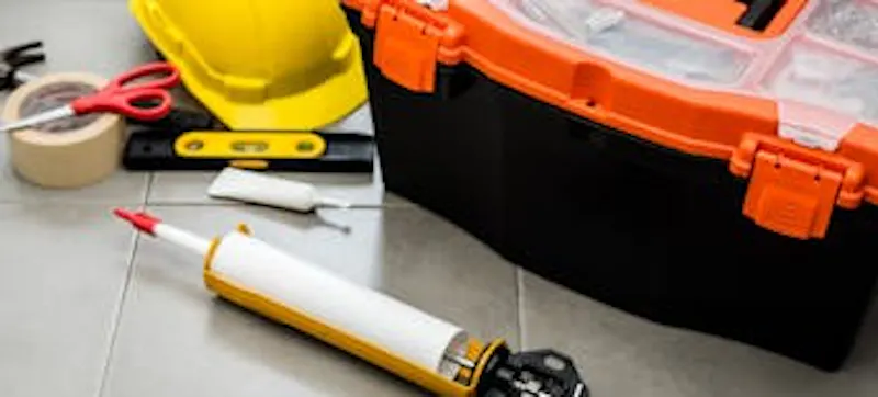 An image of a caulking gun