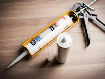 An image of a caulking gun
