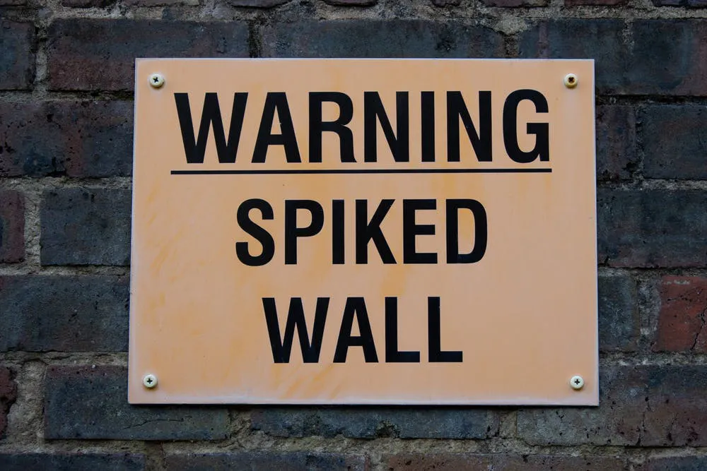 Spiked Wall Warning Sign