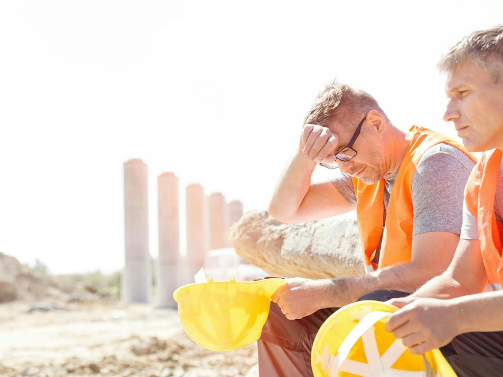 Construction Workers In The Sun