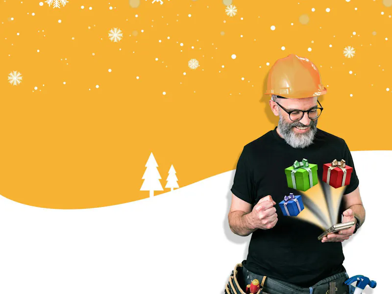 An image of a happy tradesman with his rewards