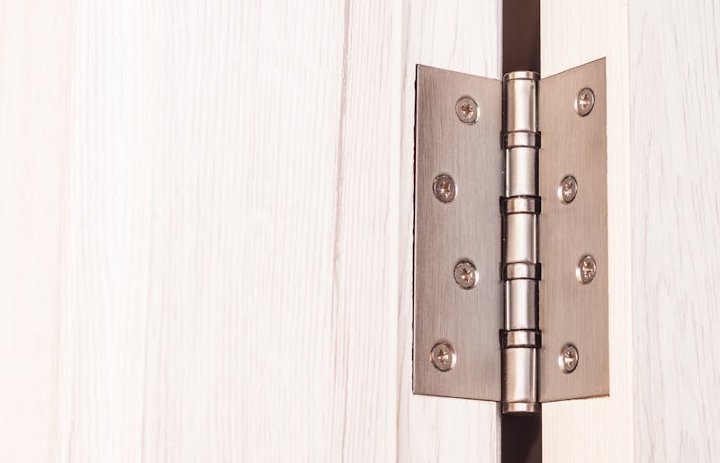 An image of a door hinge