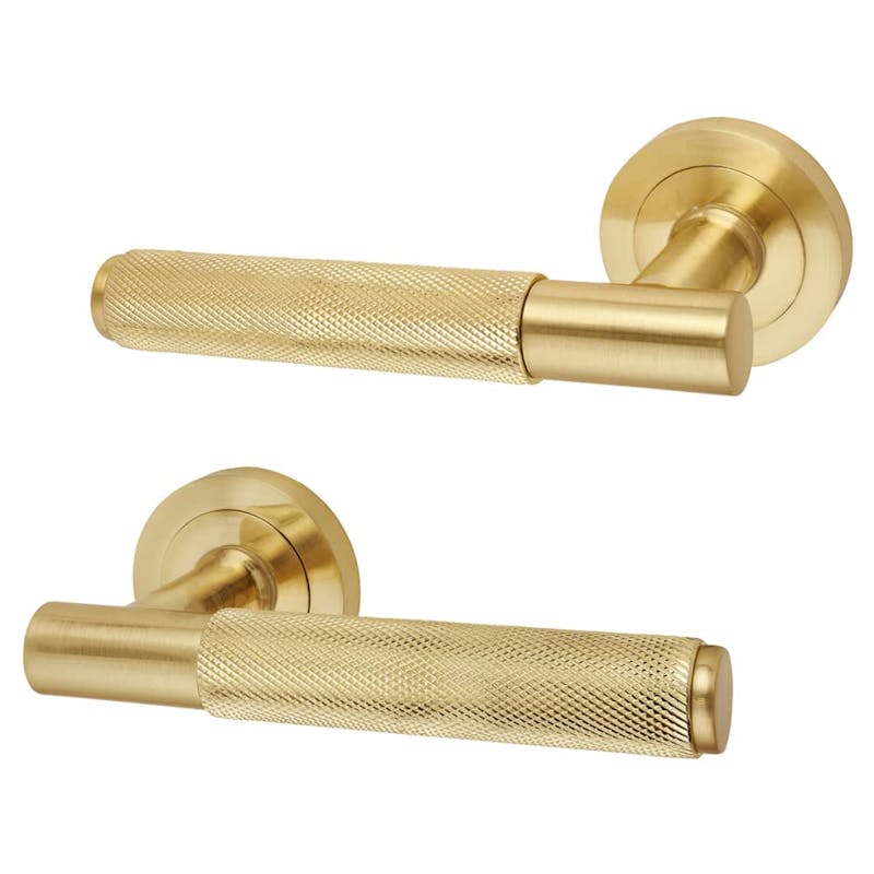 An image of brass door handles