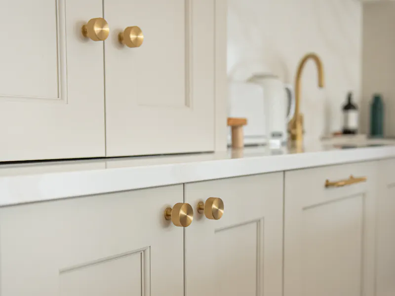 An image of kitchen handles and knobs