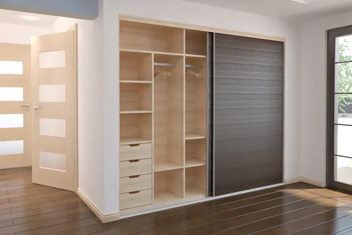 An image of a wardrobe with a sliding door