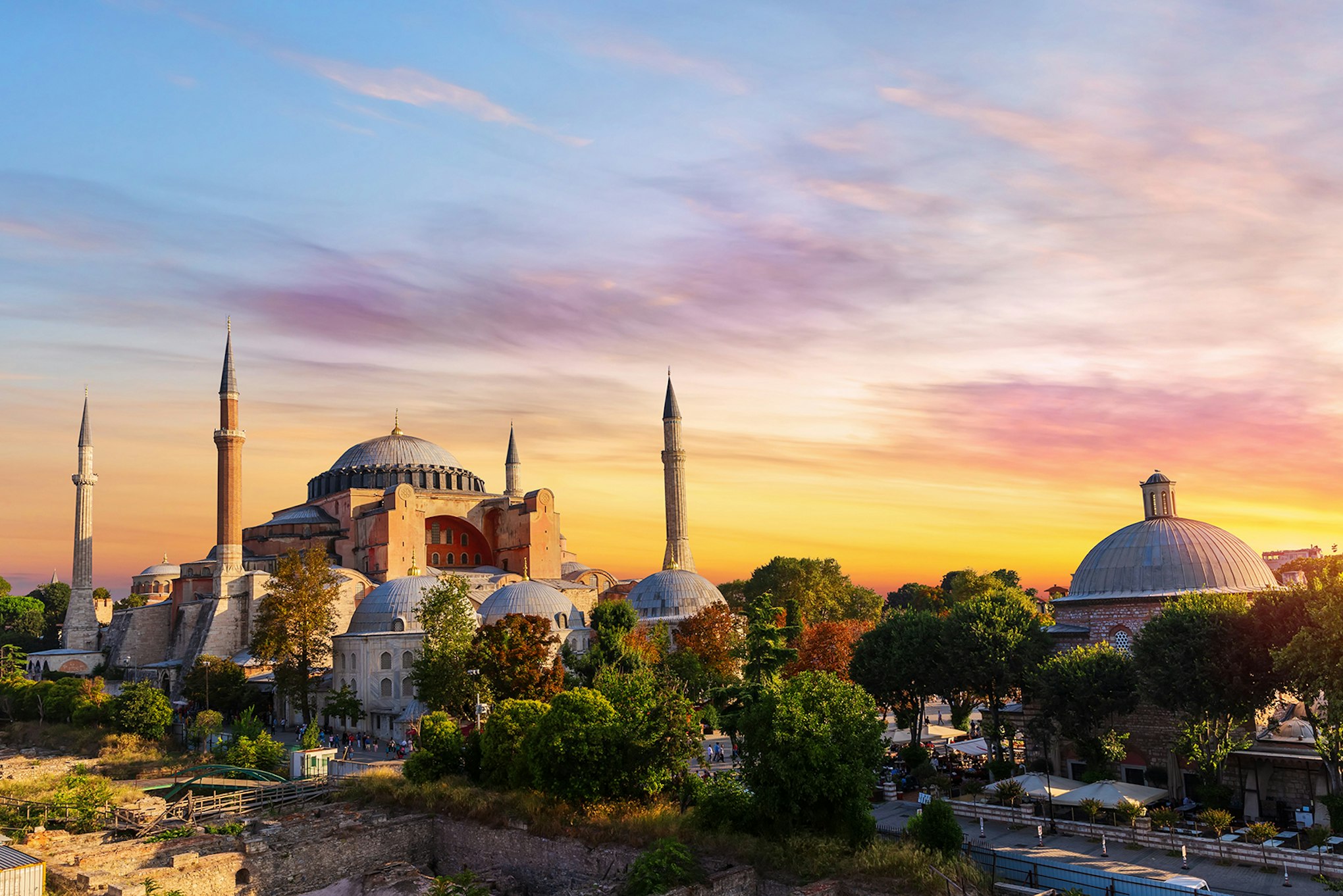 A mosque with a sunset sky behind.