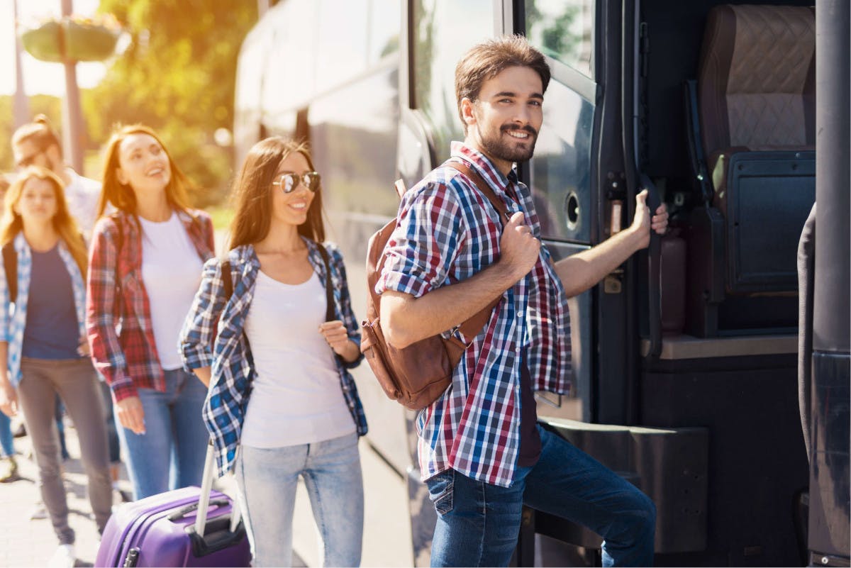 People enter bus