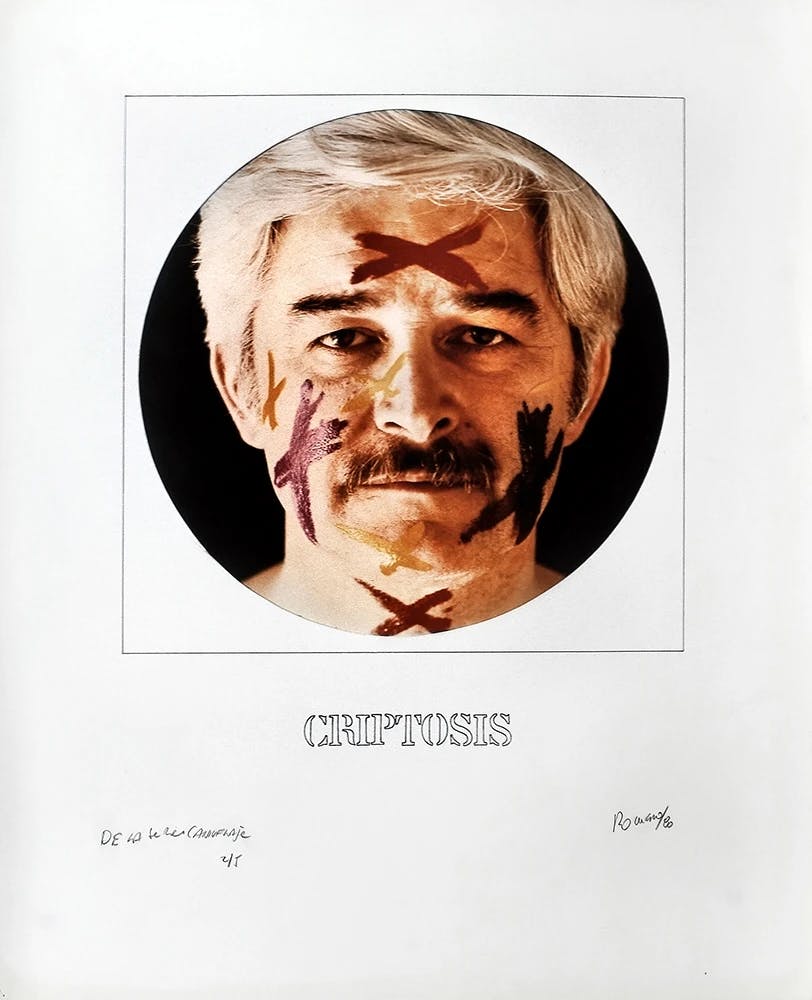 A series of four works on paper is laid out here in a grid. In the upper right corner, a head-on photograph of the artist, Juan Carlos Romero, shows his face covered with painted orange and purple X’s, accompanied by the caption “CRIPTOSIS.”