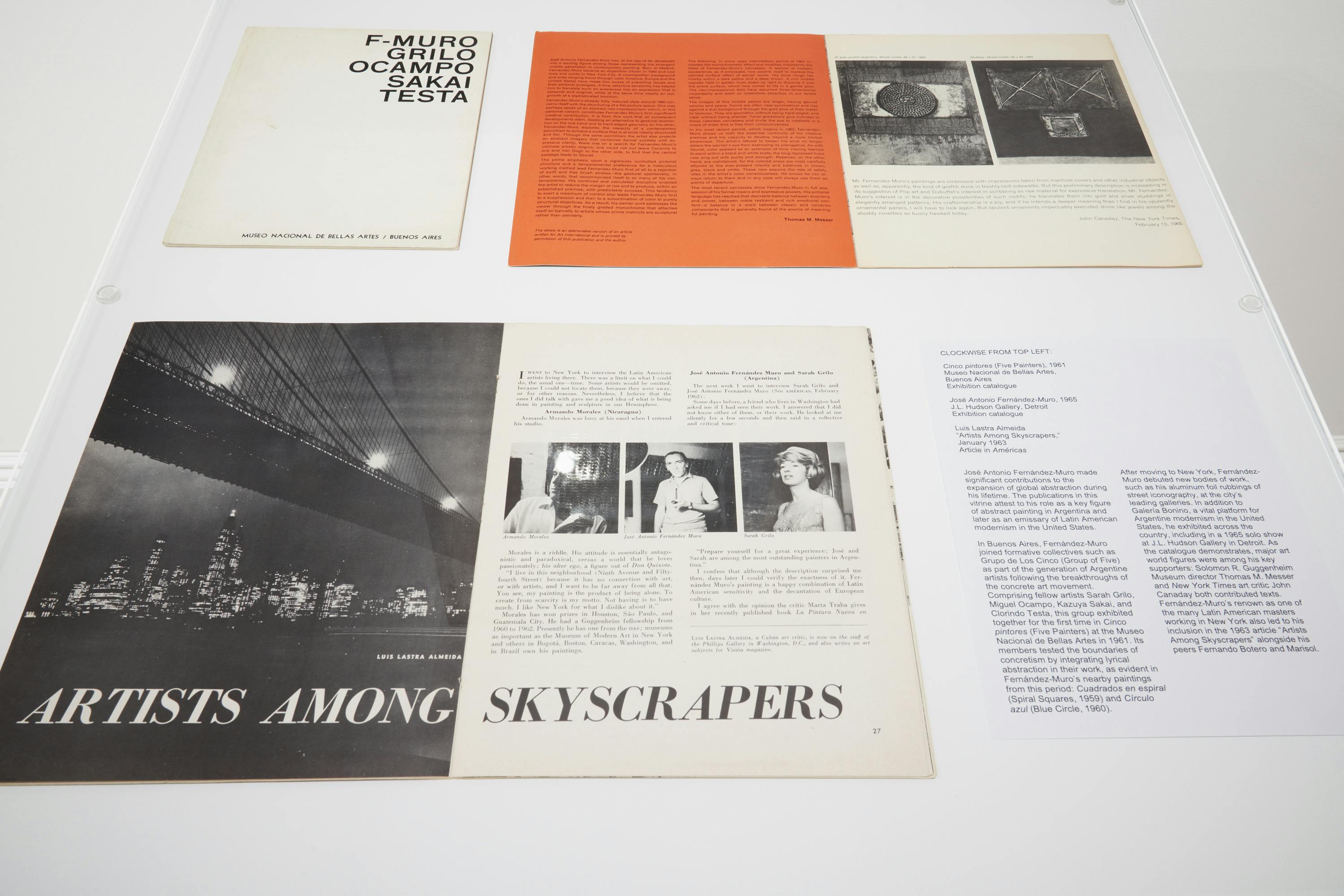 Installation view of vitrine with archival documents and publications featuring José Antonio Fernández-Muro.