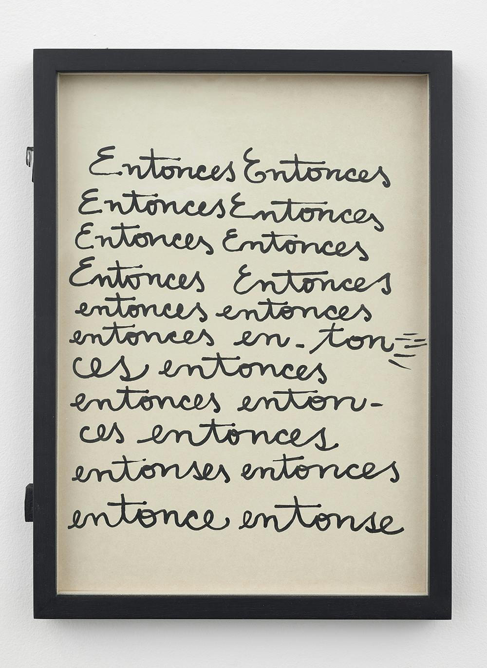 Framed, hand-painted note with the word "entonces" repeated throughout the page.