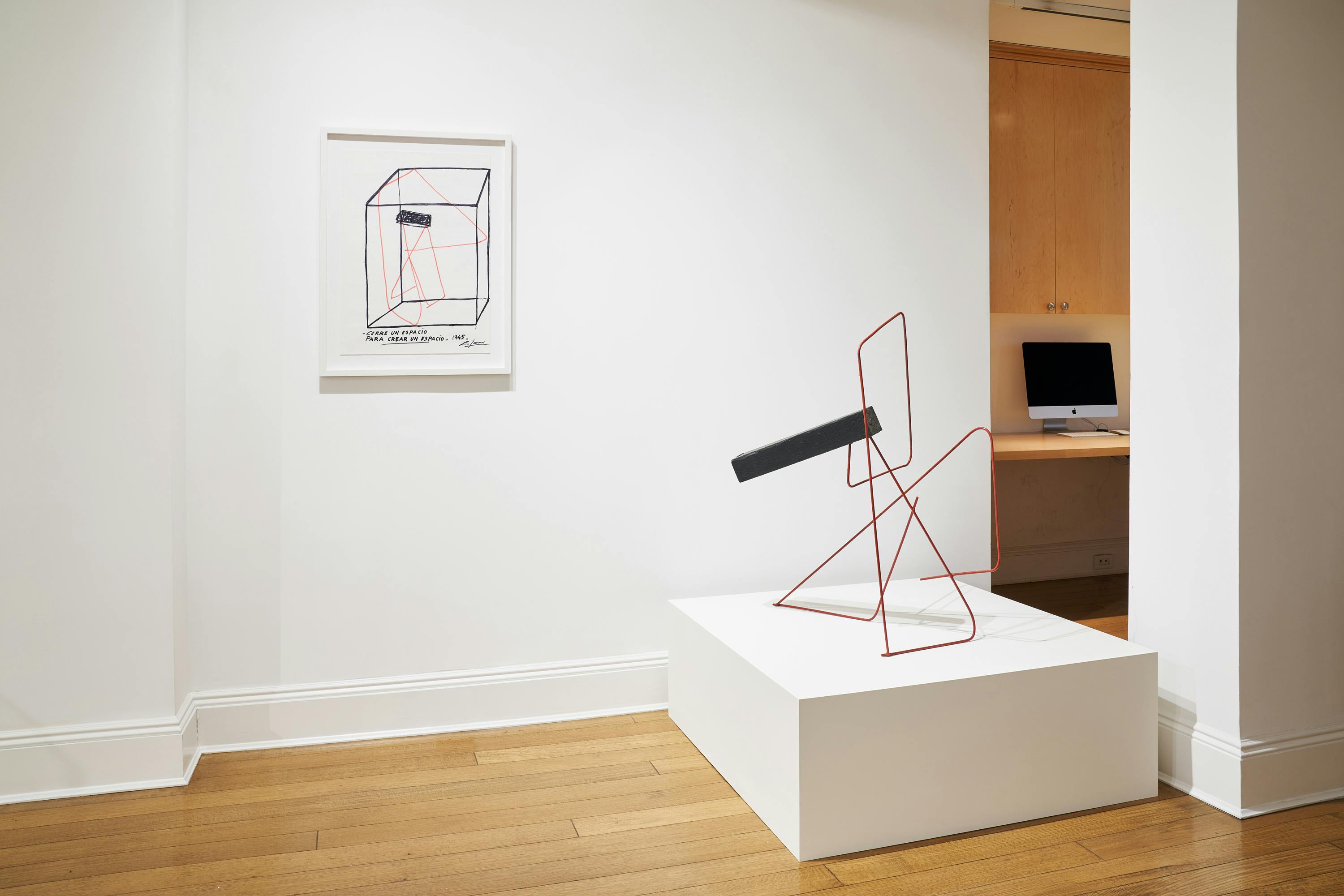 Gallery view image of an abstract sculpture accompanied by a wall-mounted drawing of the sculpture.