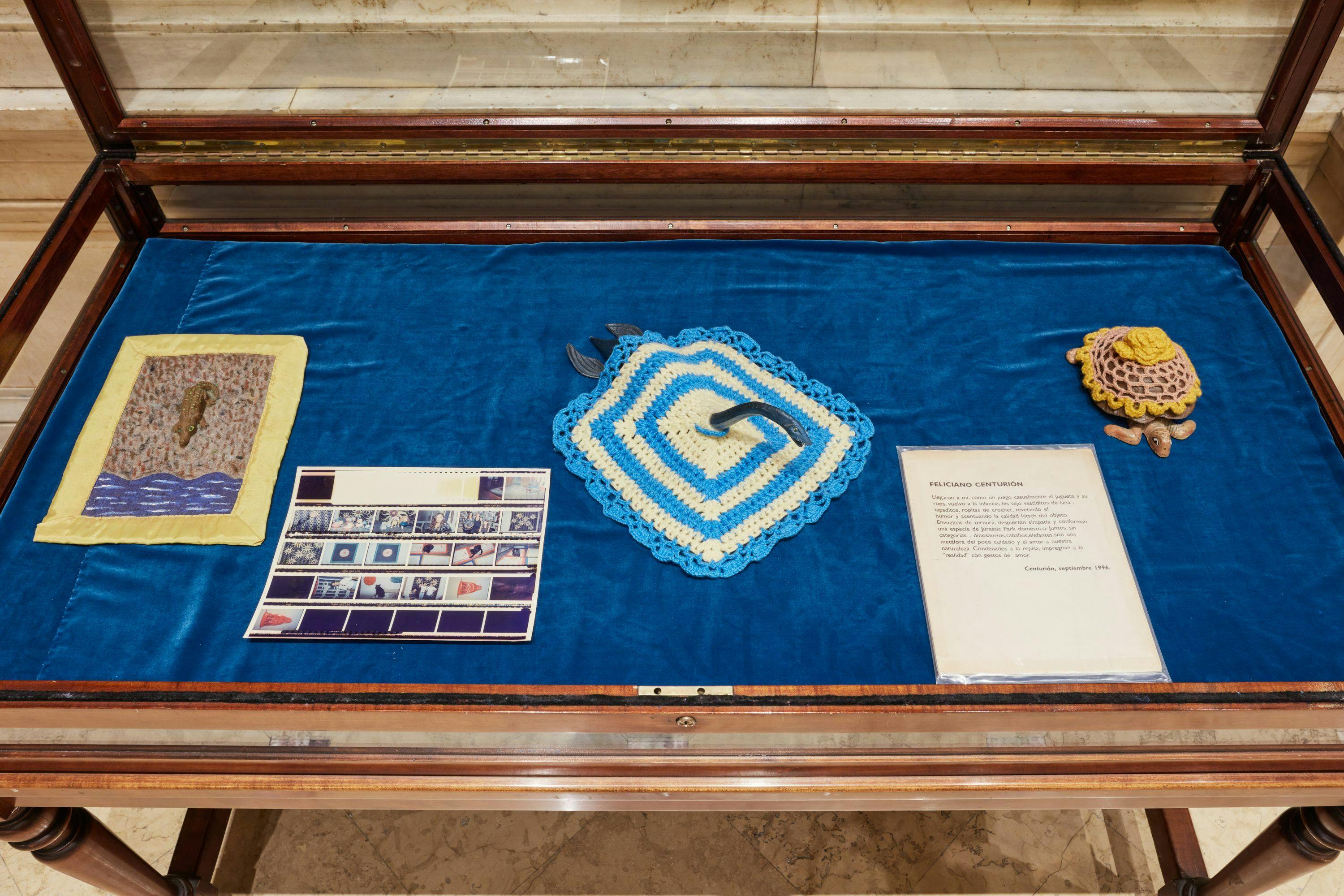 Installation view of archival items in vitrine