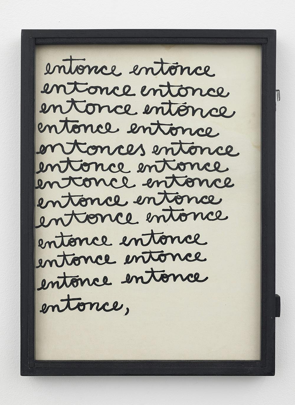 Framed, hand-painted note with the word "entonce" repeated throughout the page.