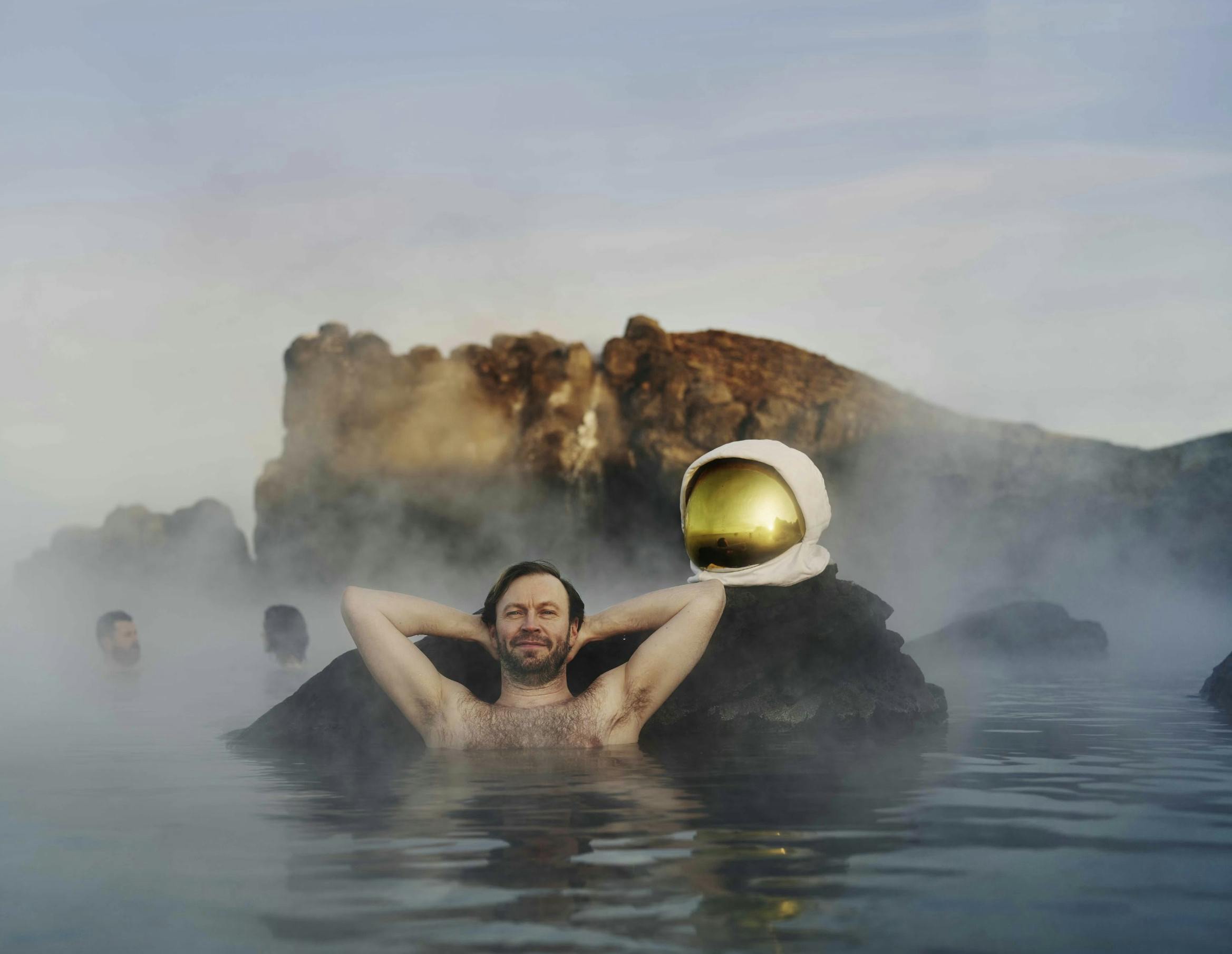 Astronaut in a geothermal spa 