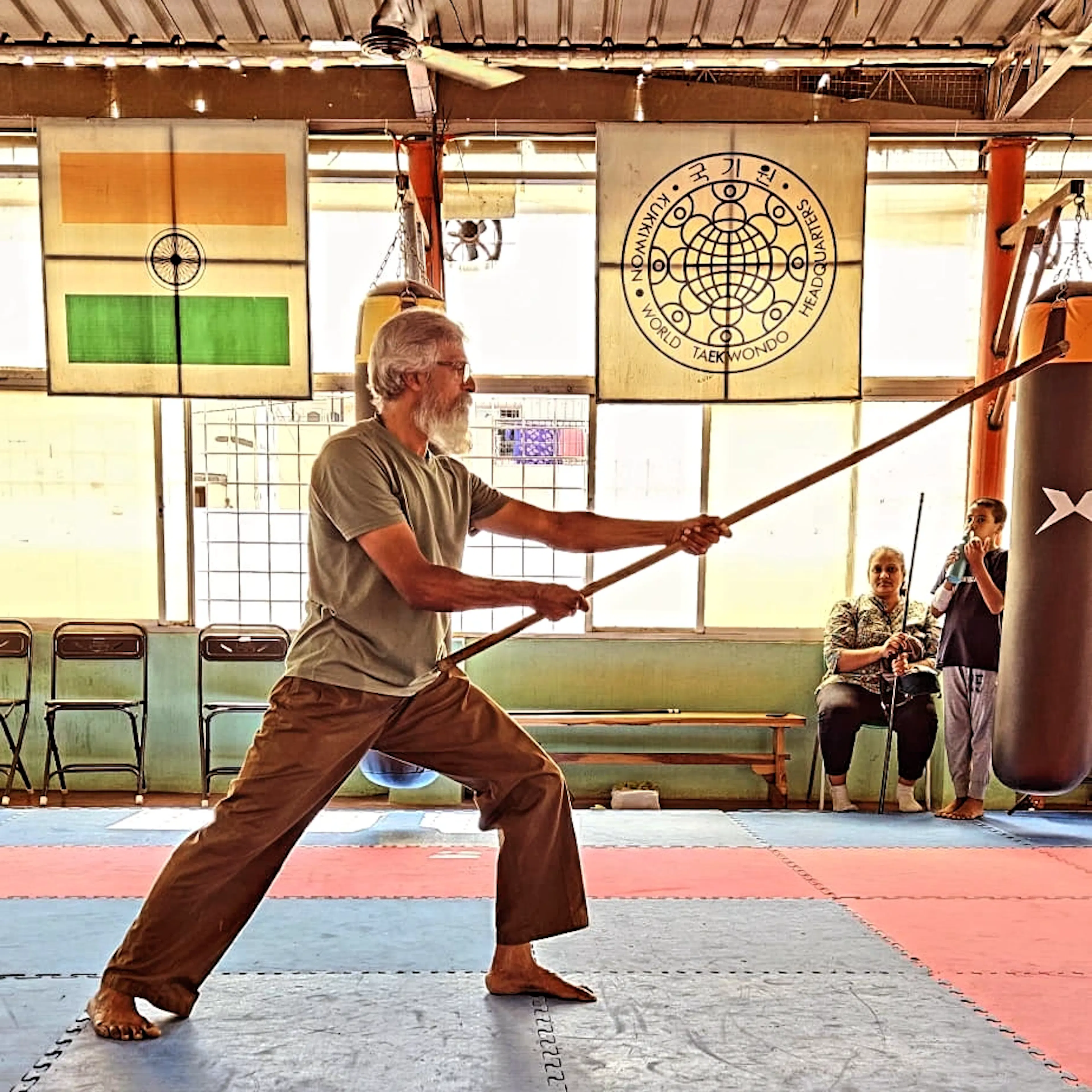 Master KK demonstrating the Silambam staff technique