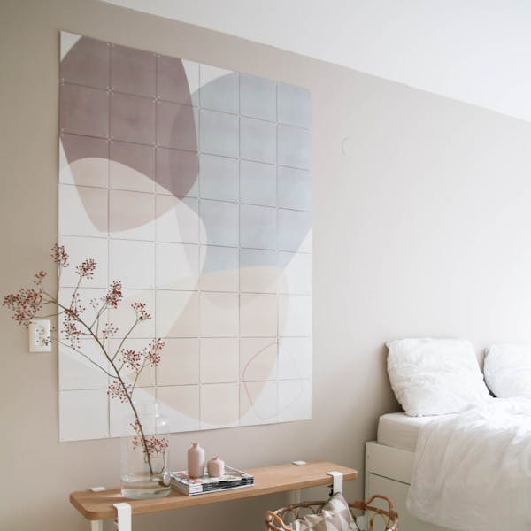 Abstract wall decoration by Mareike Böhmer in a bedroom in natural tones