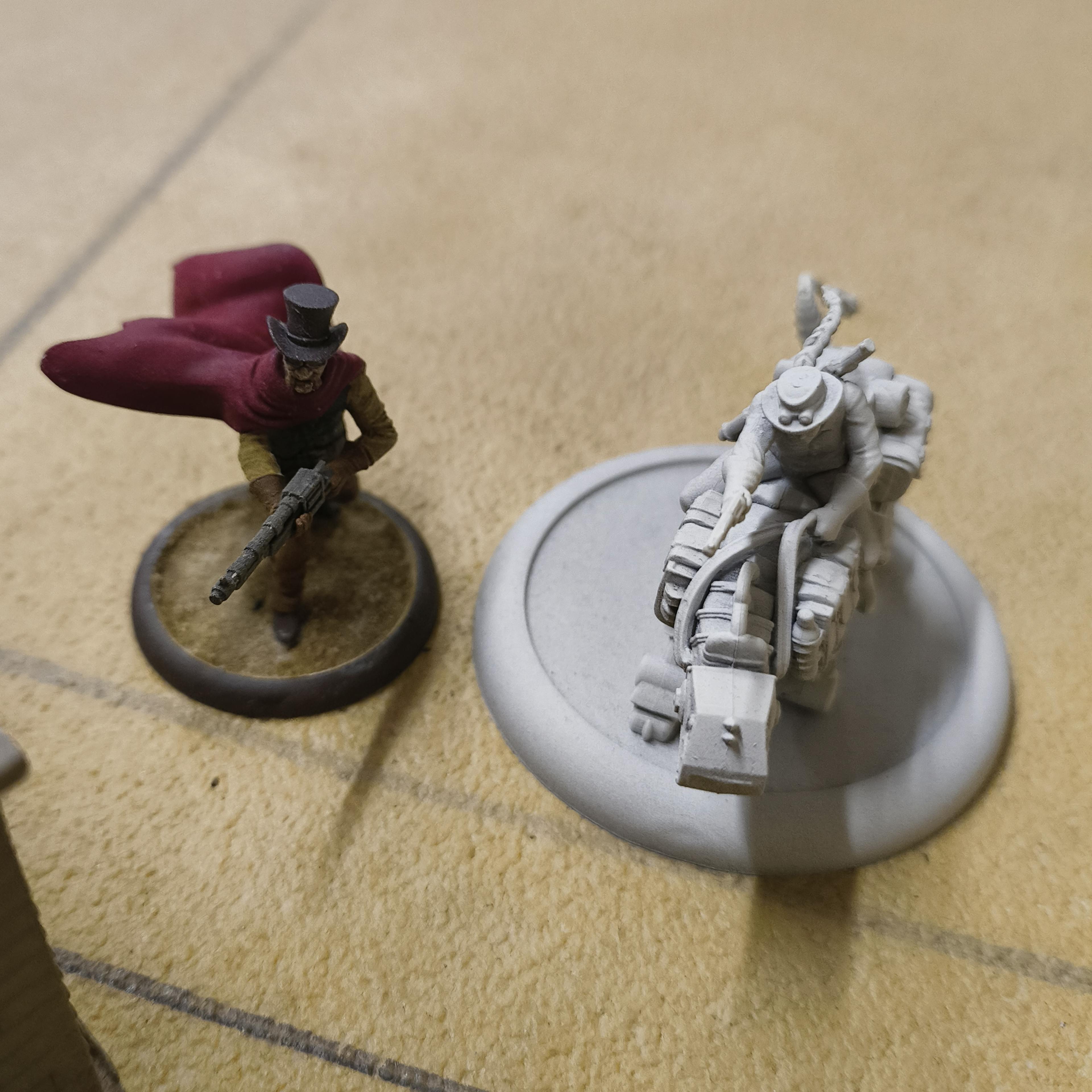 Mad Dog and Ella Mae Malifaux models.