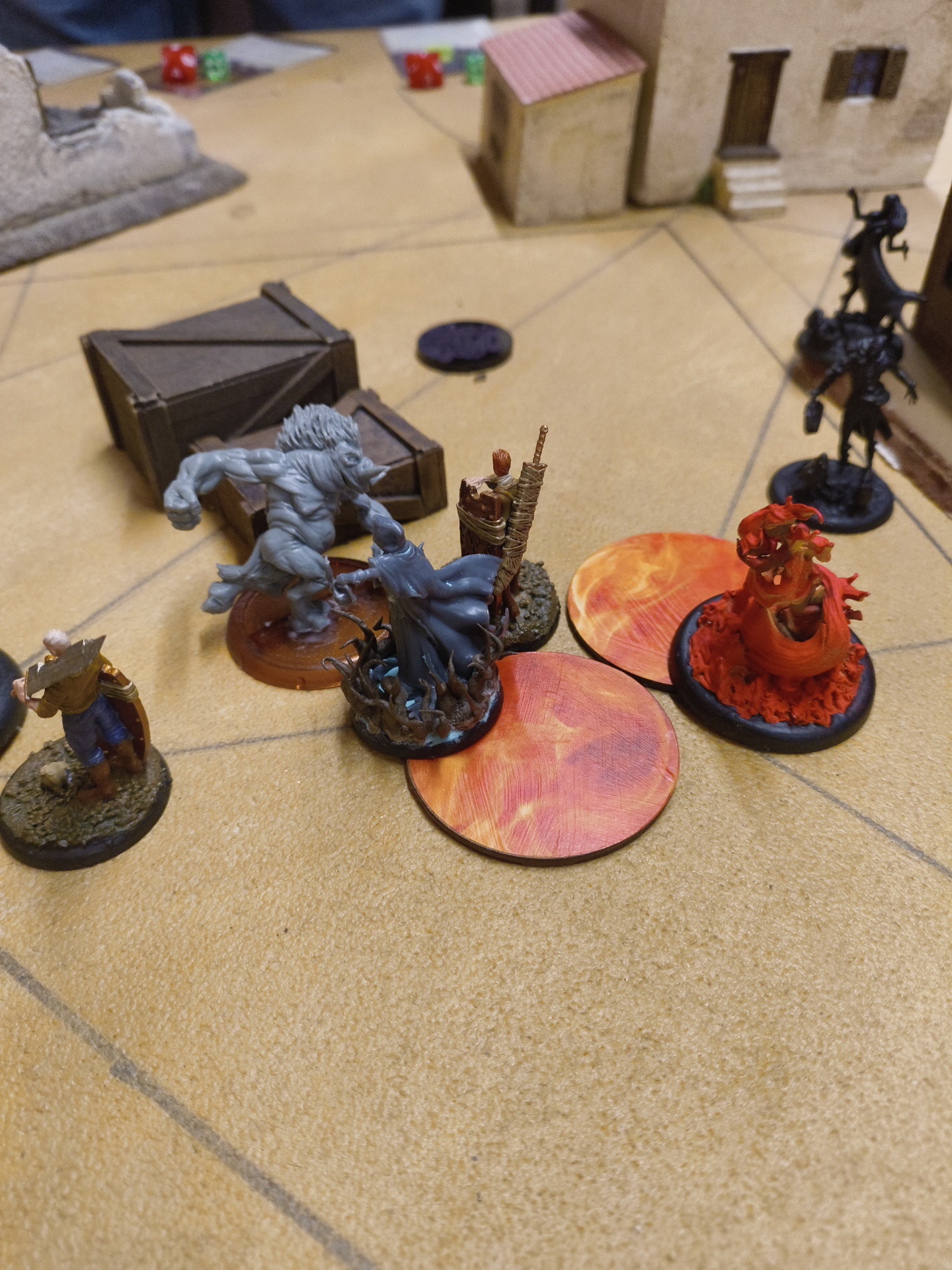 Reva and Swine Cursed models facing off in a Pyre Marker