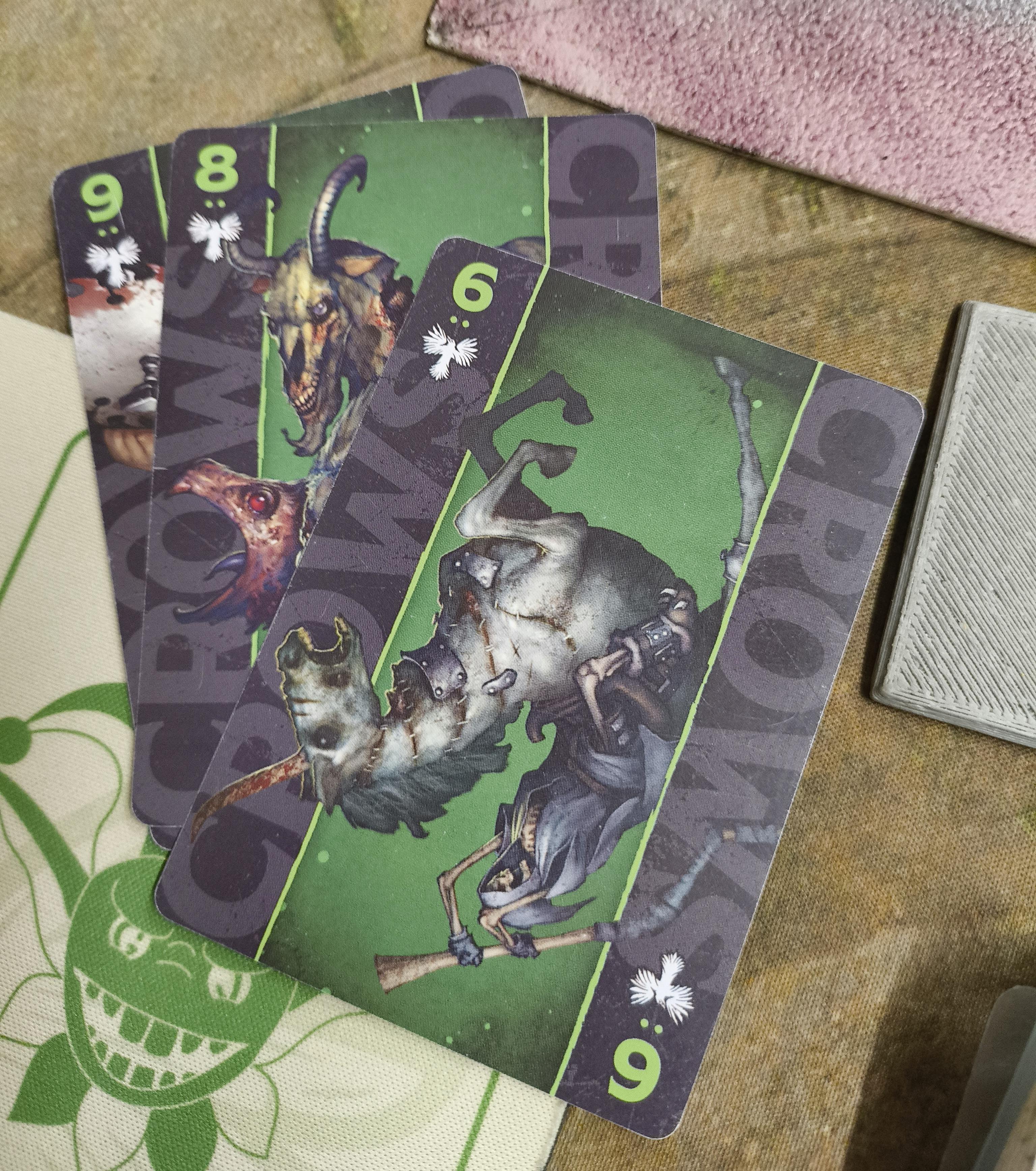 Three moderate Malifaux cards