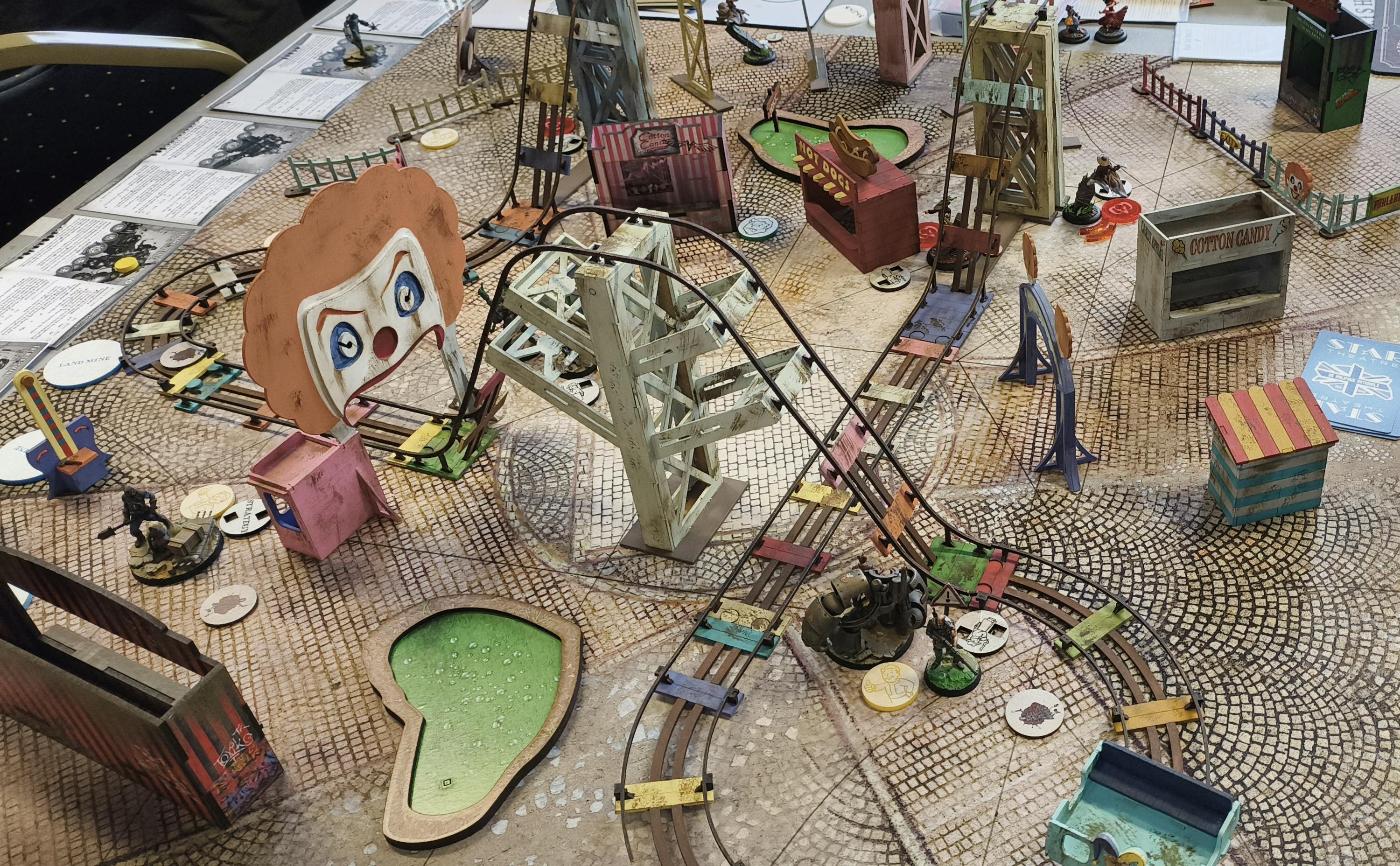 A malifaux board set up like a fairground.