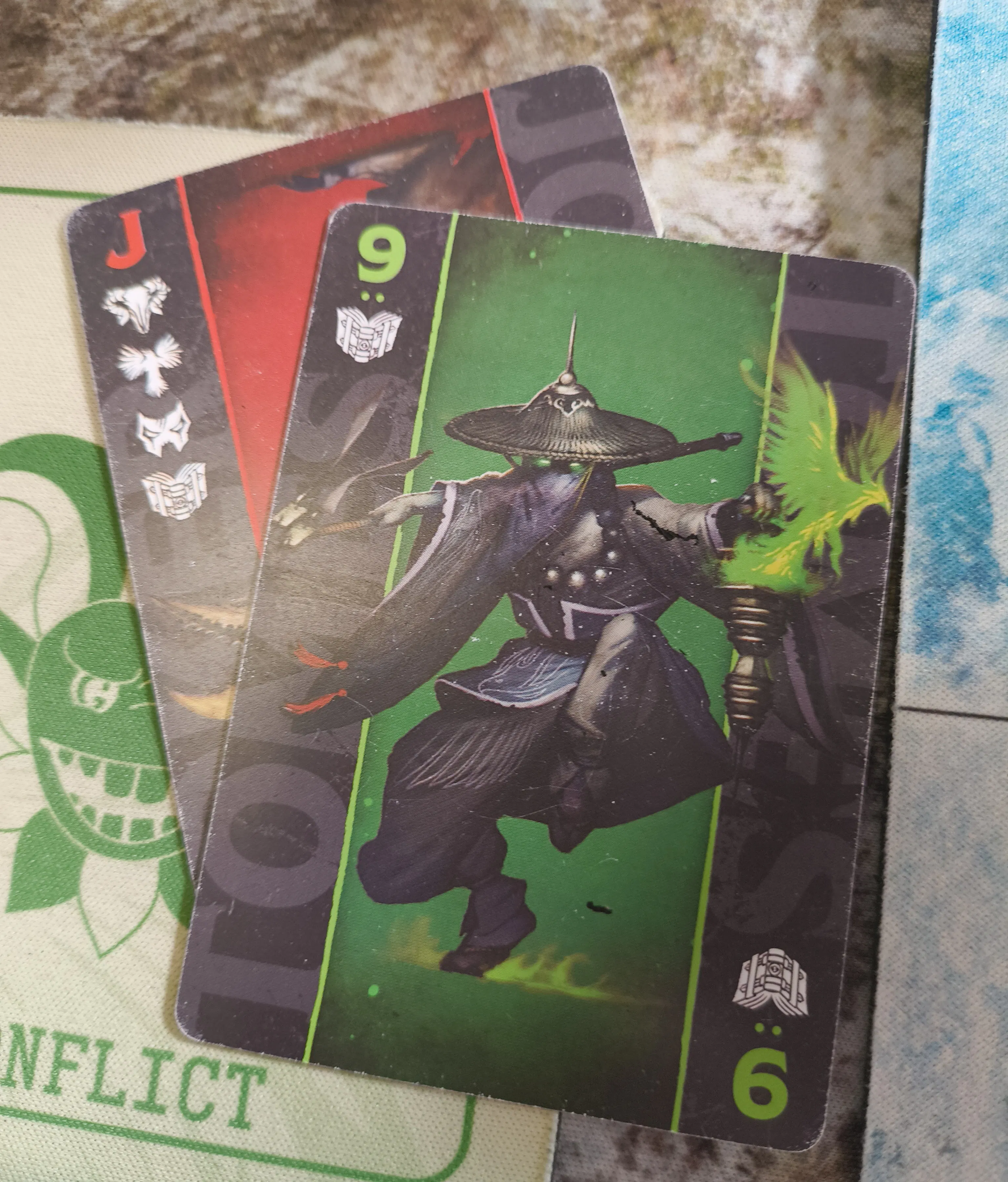 A Red Joker and a 9 of Tomes