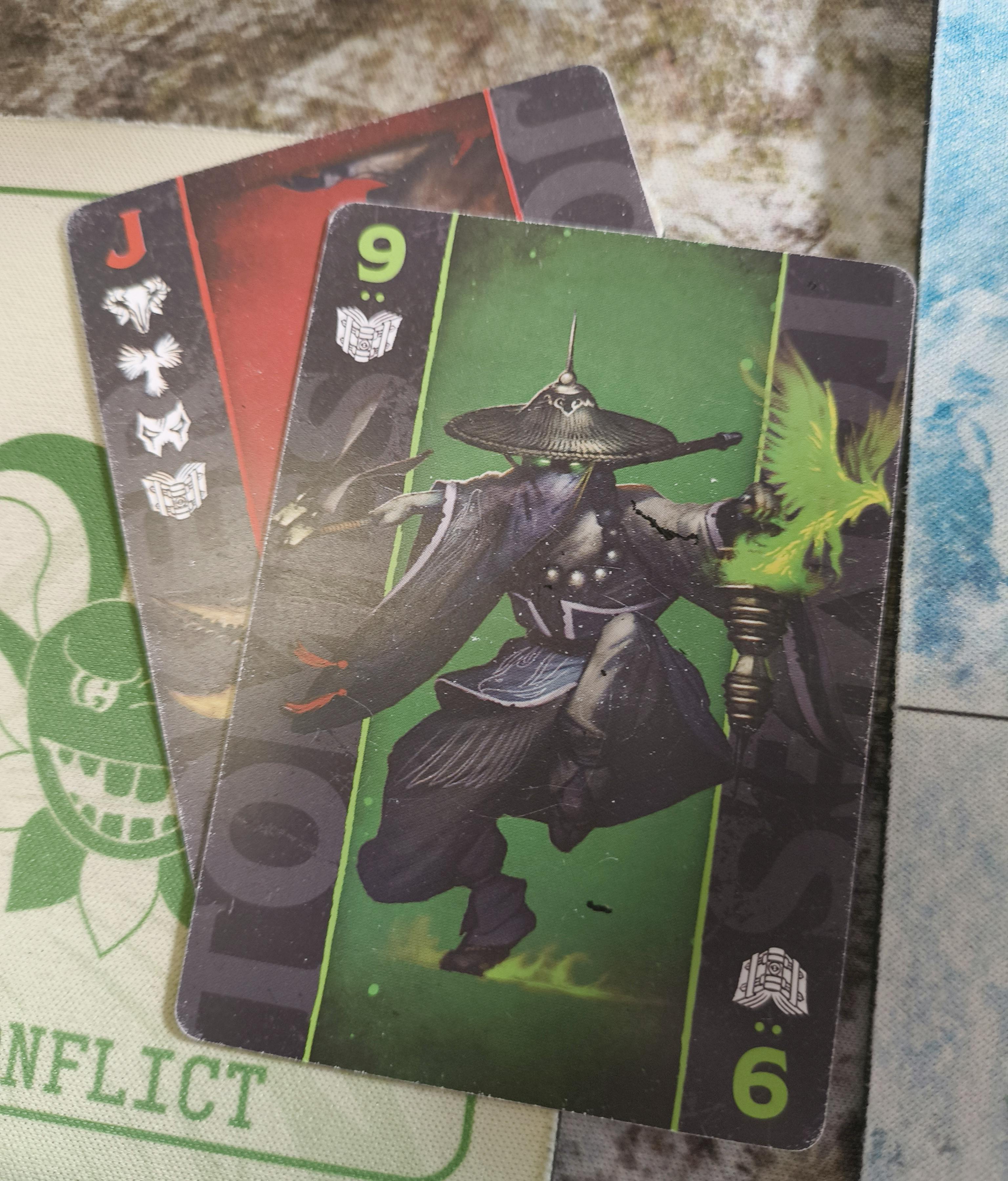 A Red Joker and a 9 of Tomes