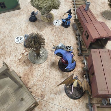 Kastore and a Cavern Nephilim near a train.