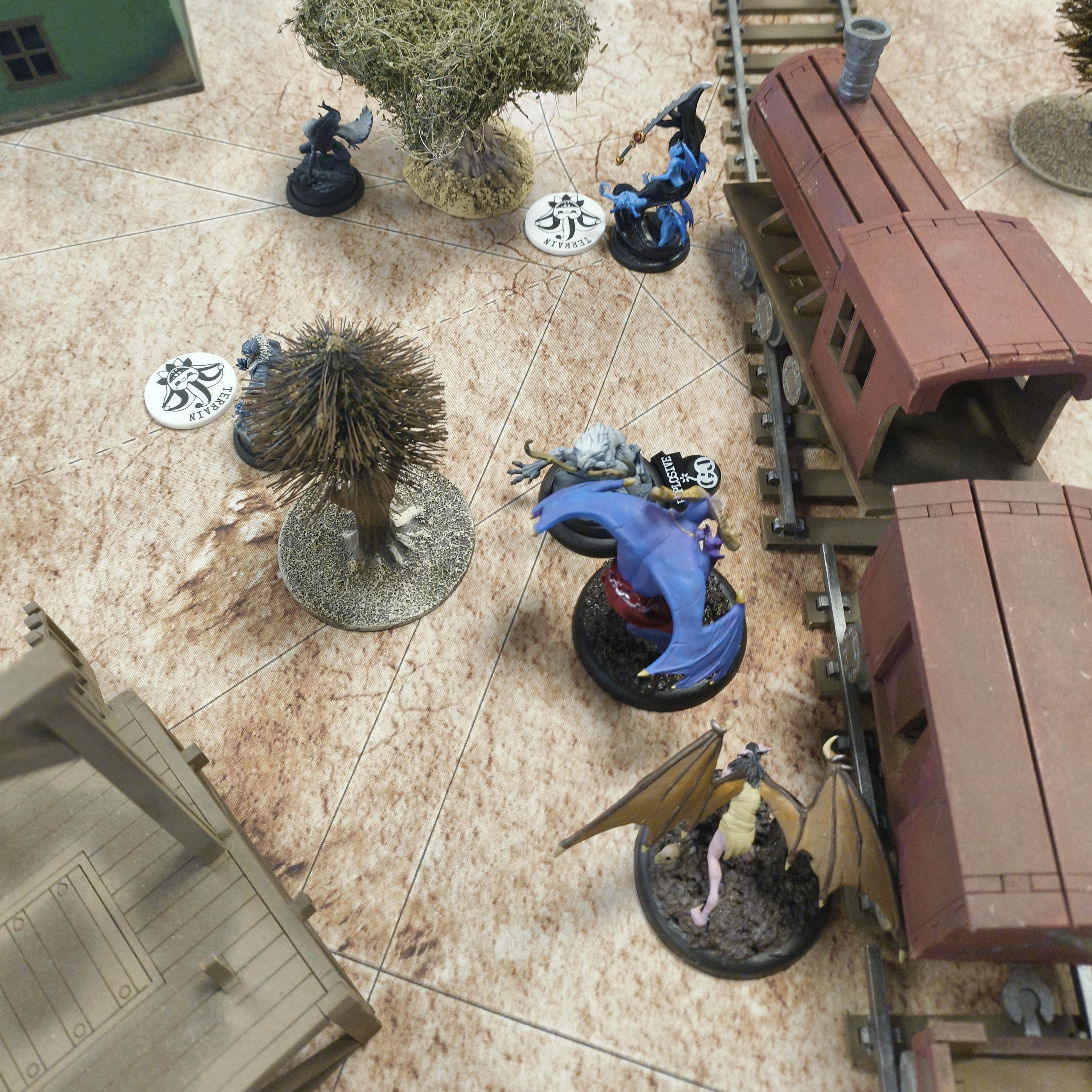 Kastore and a Cavern Nephilim near a train.