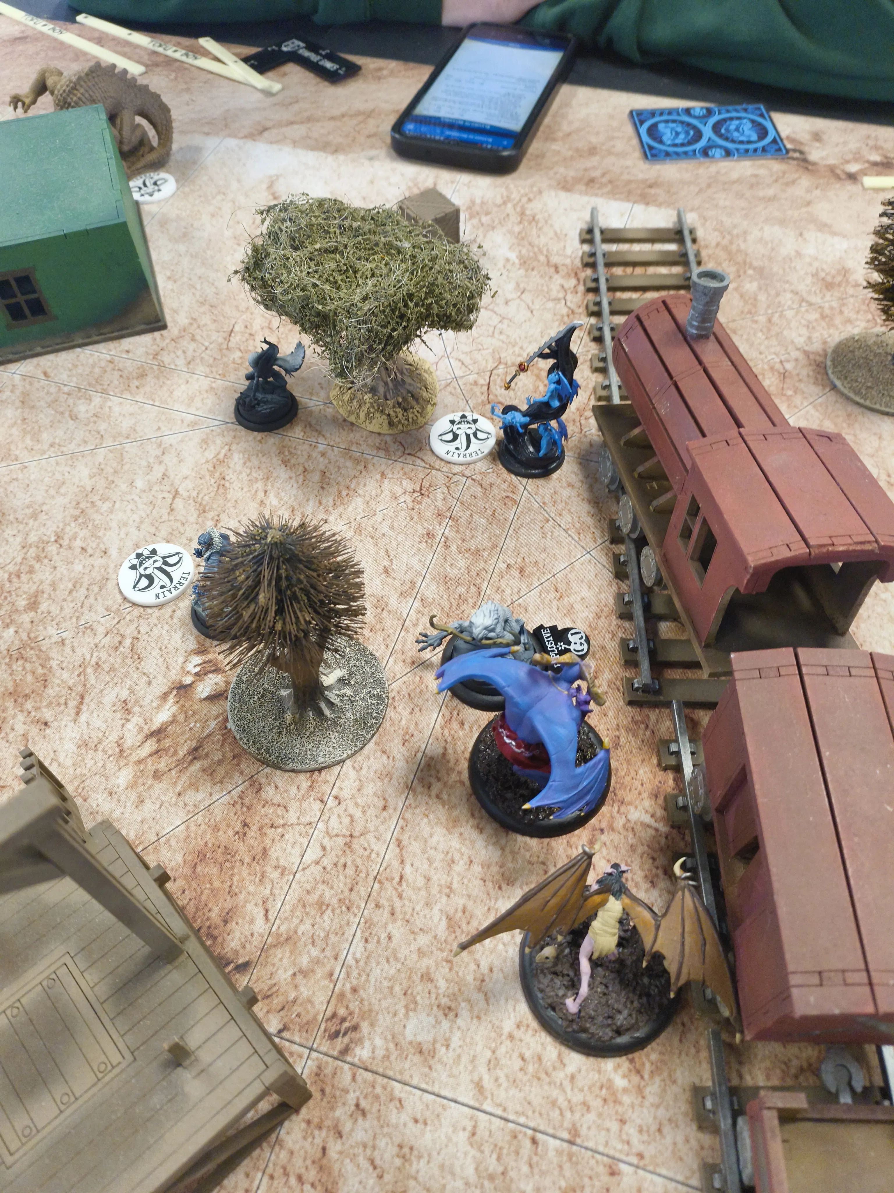 Kastore and a Cavern Nephilim near a train.