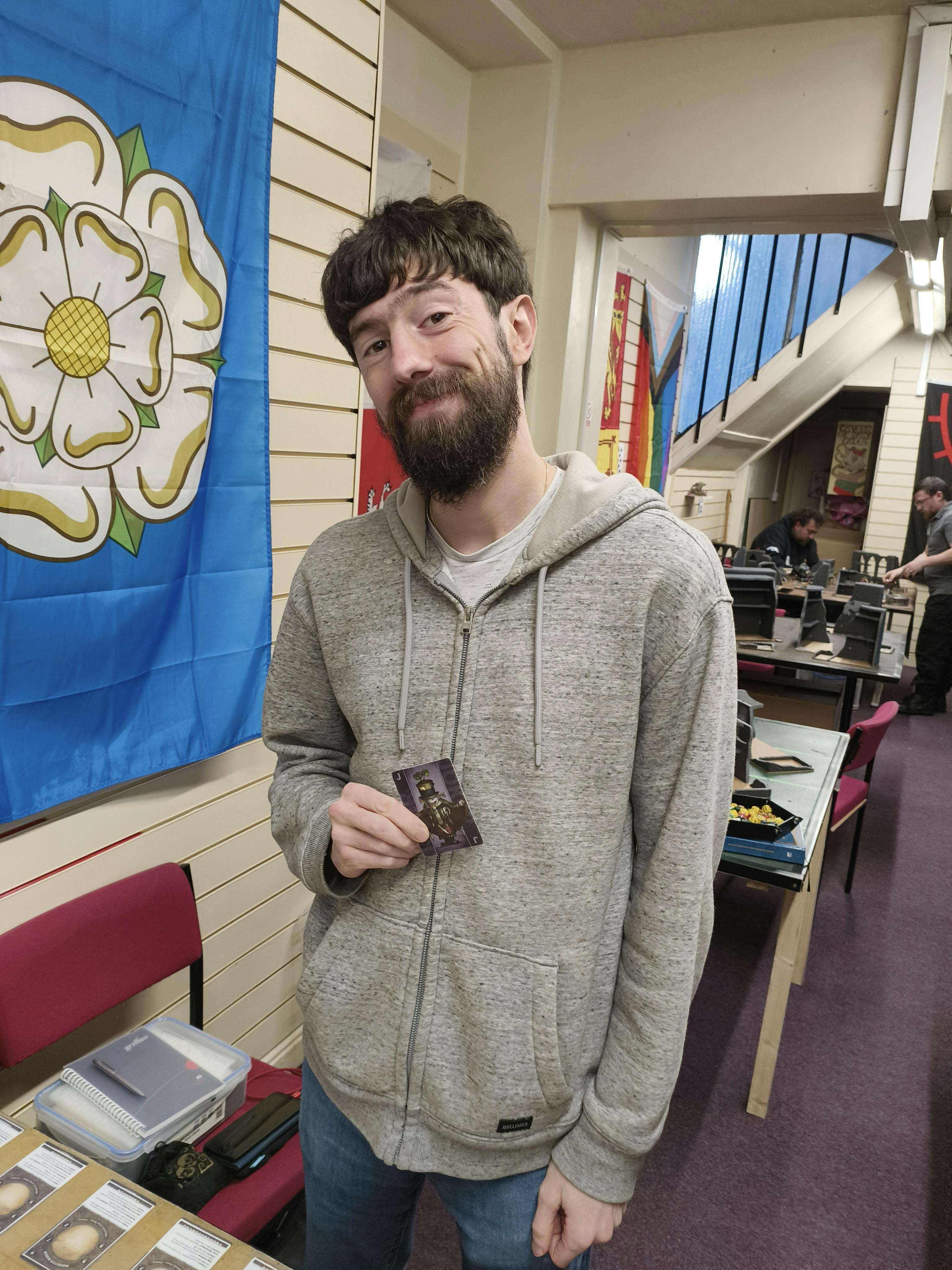 Adam holding a Black Joker