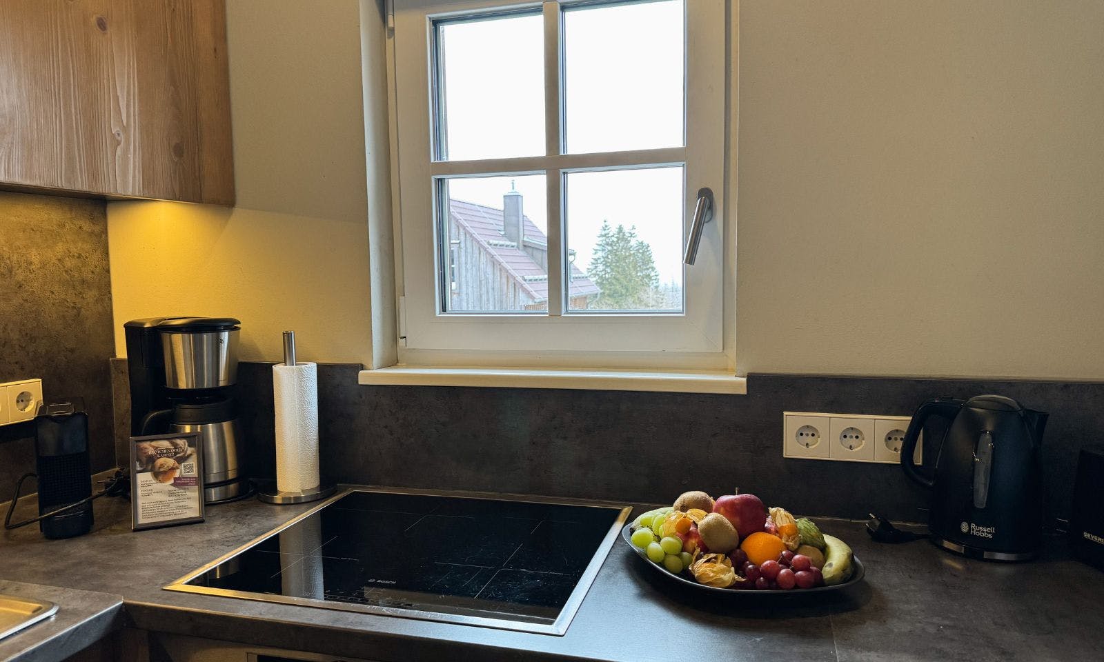 Offene Küche und Essbereich in der Premium Lodge Plus