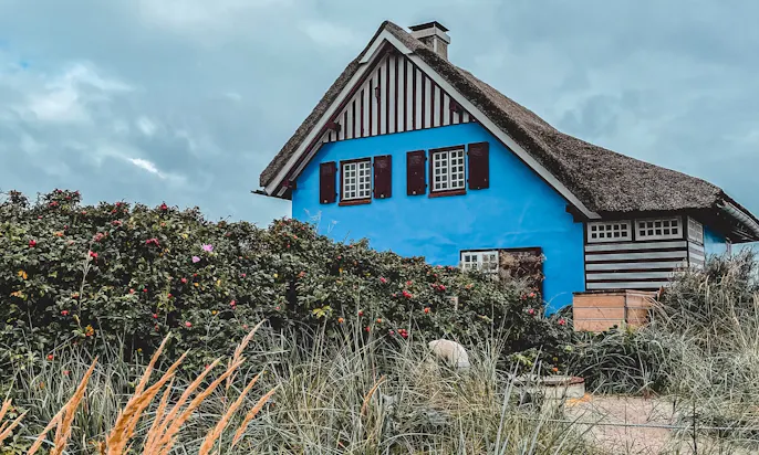 Das blaue Haus auf dem Graswarder in Heiligenhafen am Strand