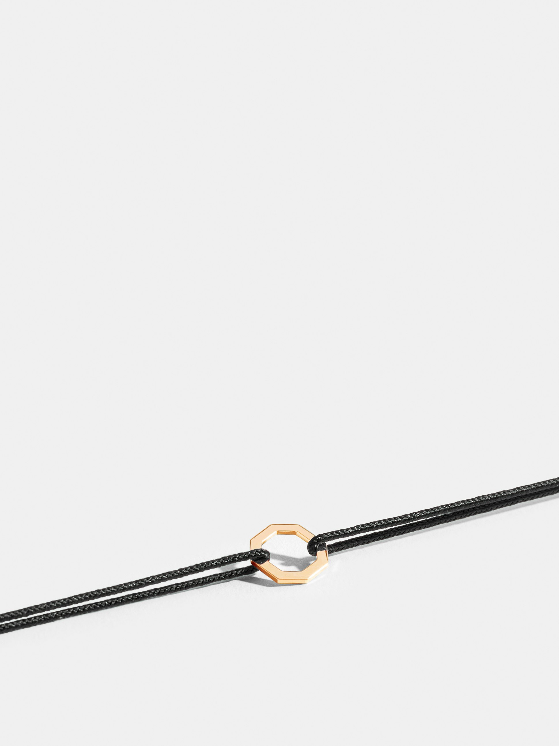Octogone motif in 18k Fairmined ethical yellow gold, on a cord. 