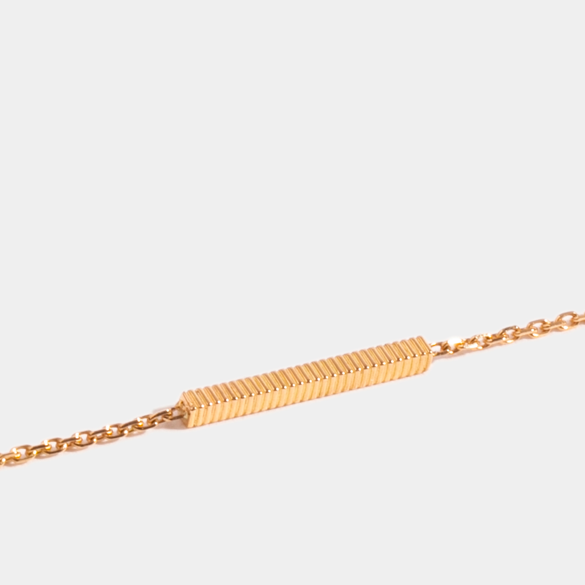PAVED ANAGRAM OPEN GOLD BRACELET