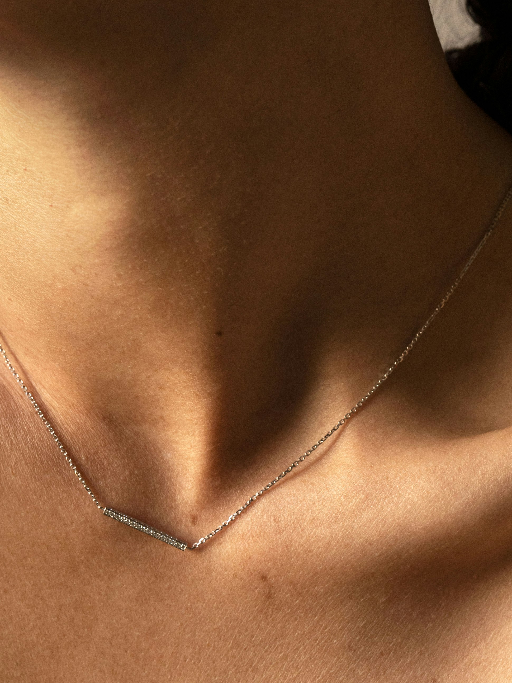 Anagramme paved flat ribbon necklace