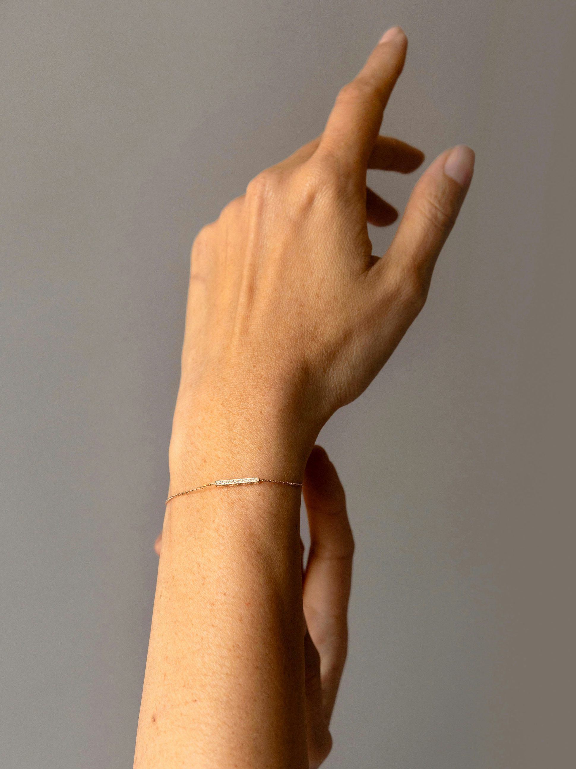 Anagramme paved bracelet in 18k Fairmined ethical yellow gold, on a chain | JEM jewellery ethically minded