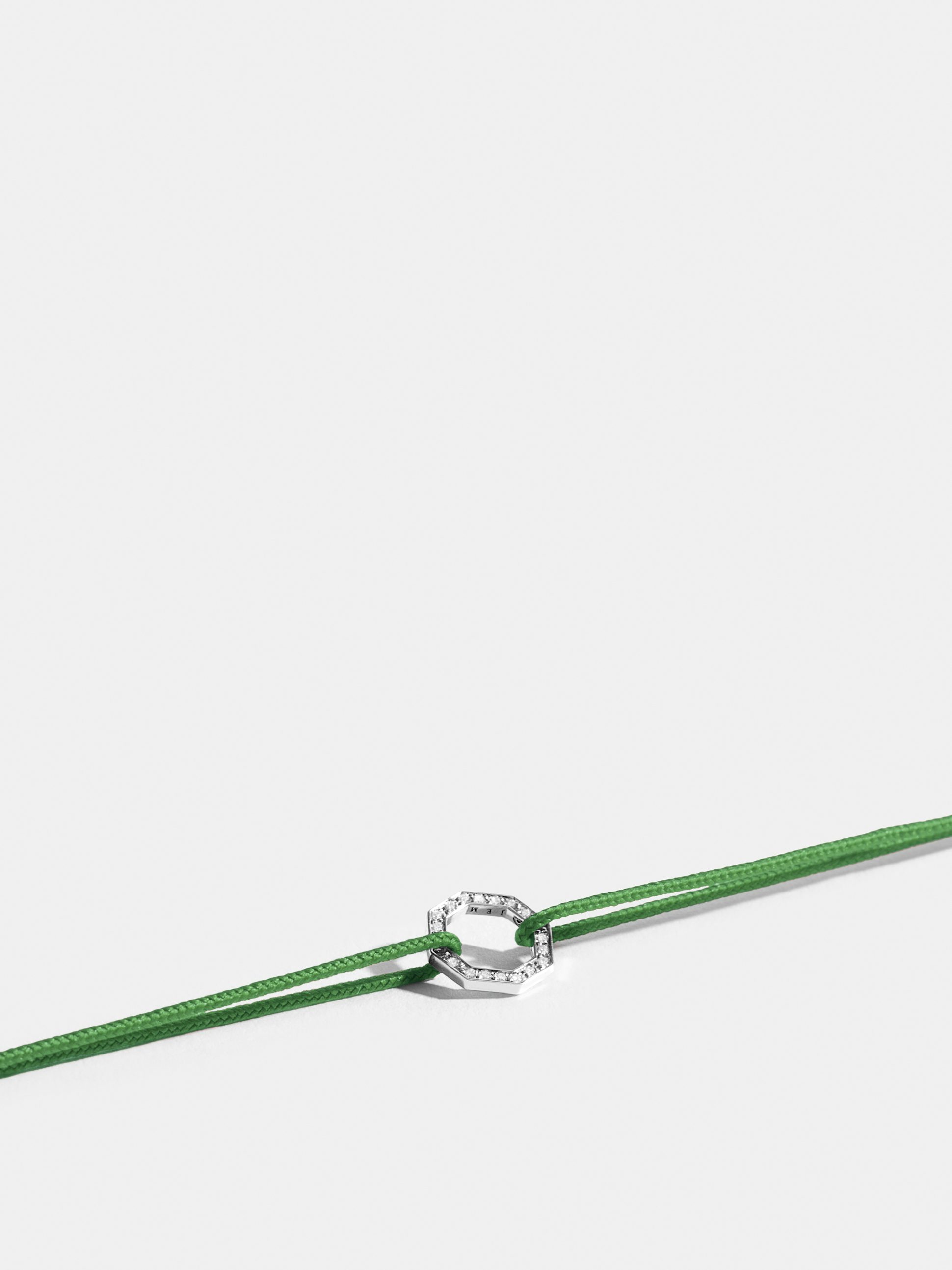 Octogone motif in 18k Fairmined ethical white gold, paved with lab-grown diamonds, on an apple green cord.