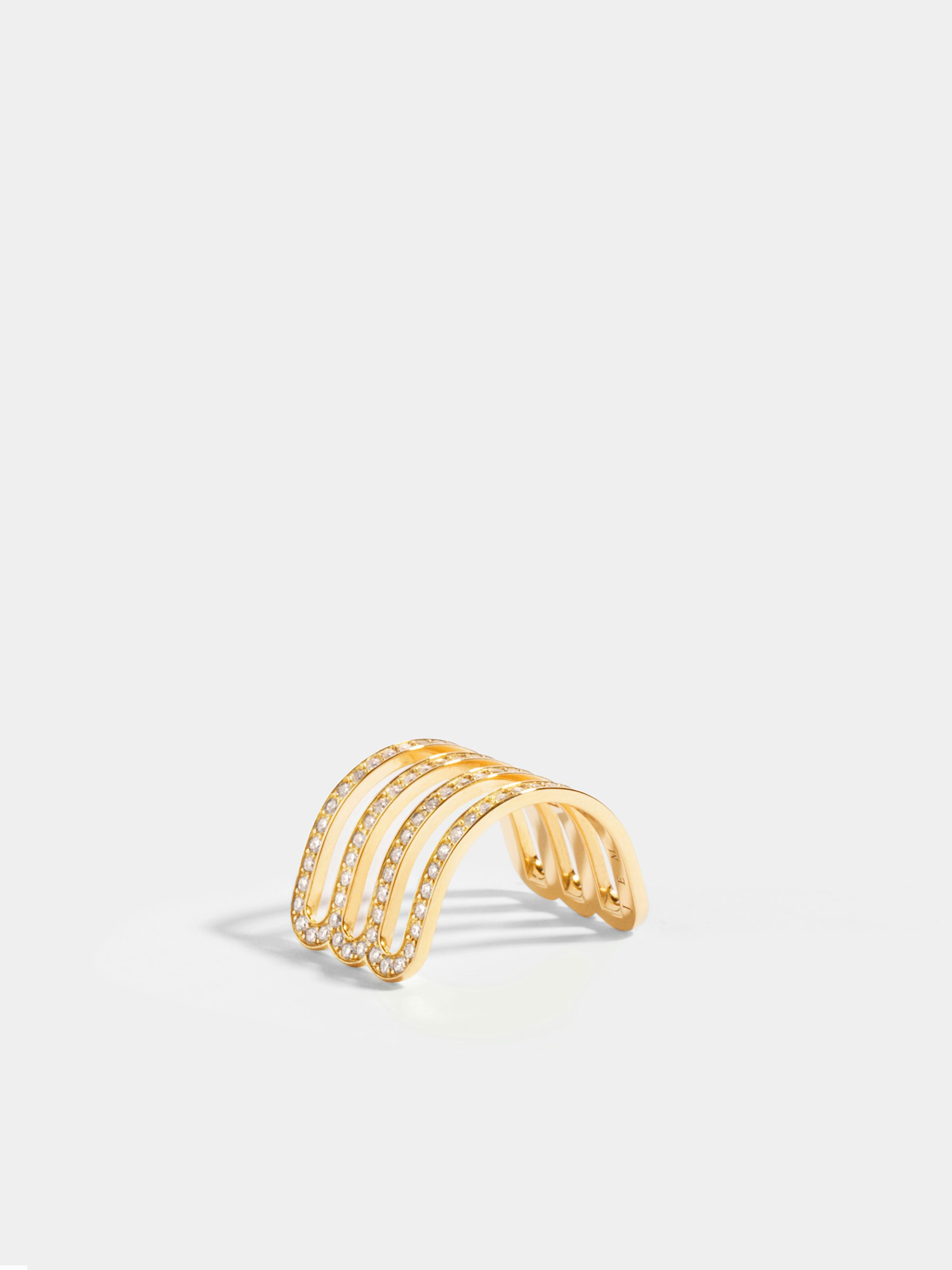 Étreintes triple half-ring in 18k Fairmined ethical yellow gold, paved with lab-grown diamonds.