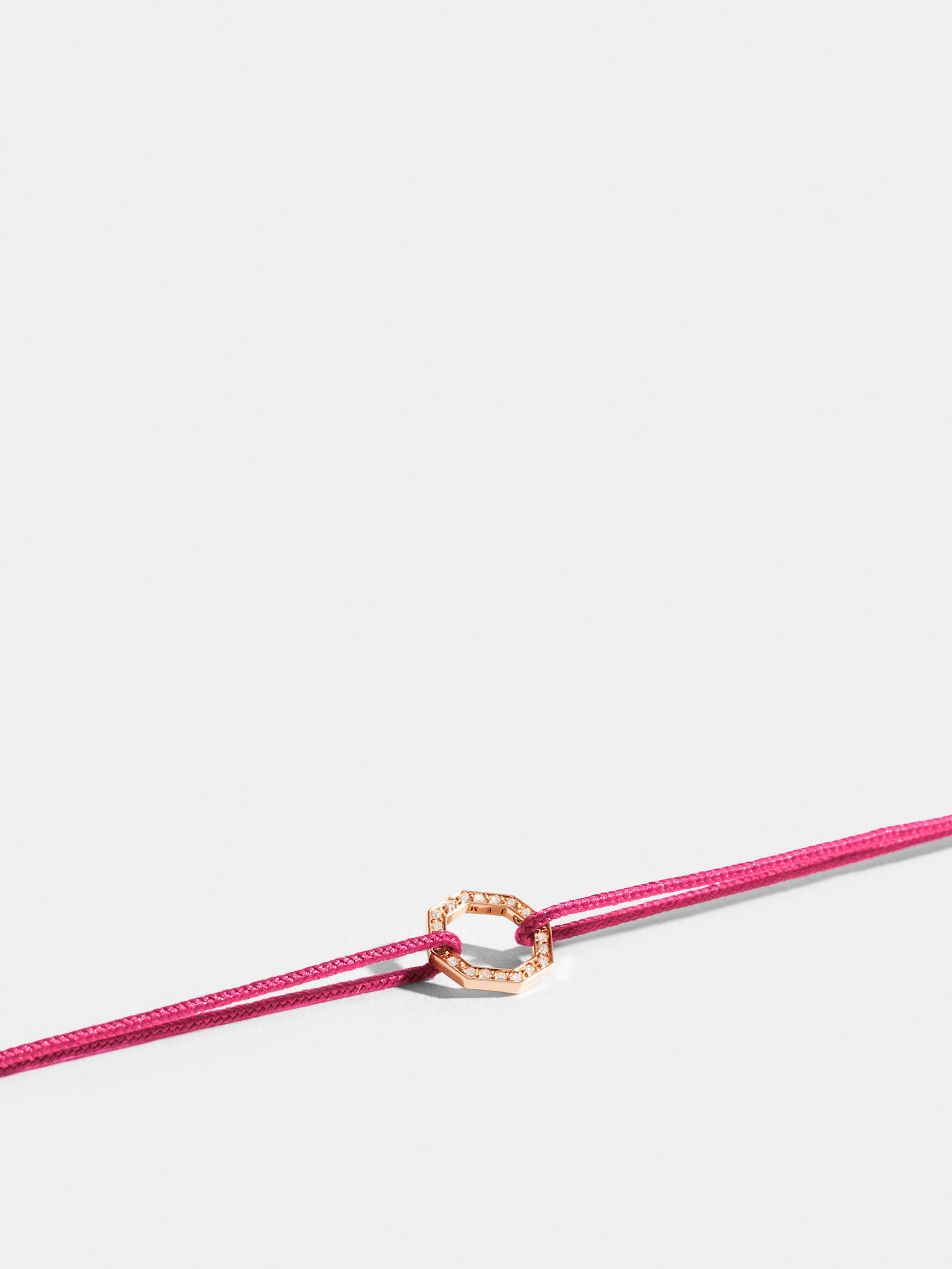 Octogone motif in 18k Fairmined ethical rose gold, paved with lab-grown diamonds, on a fuschia pink cord.