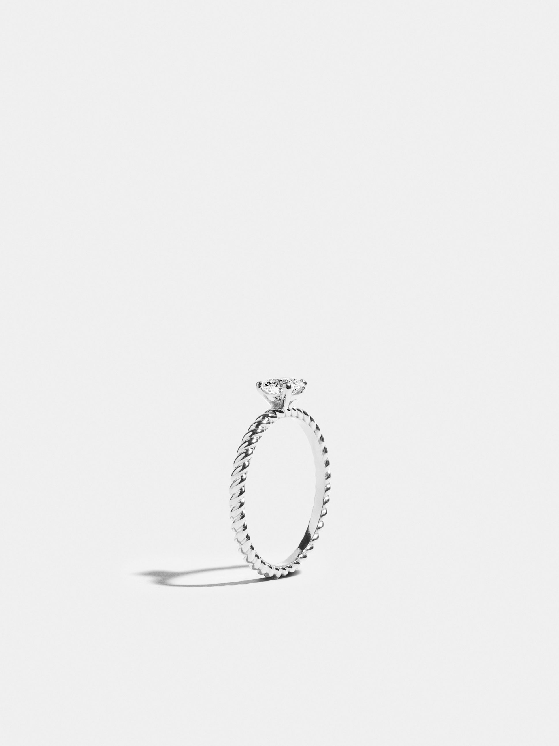 Solitaire Anagramme twisted in white gold 18k Fairmined ethical set with a 0.50 carat synthetic brilliant cut diamond | JEM Jewellery Ethically Minded