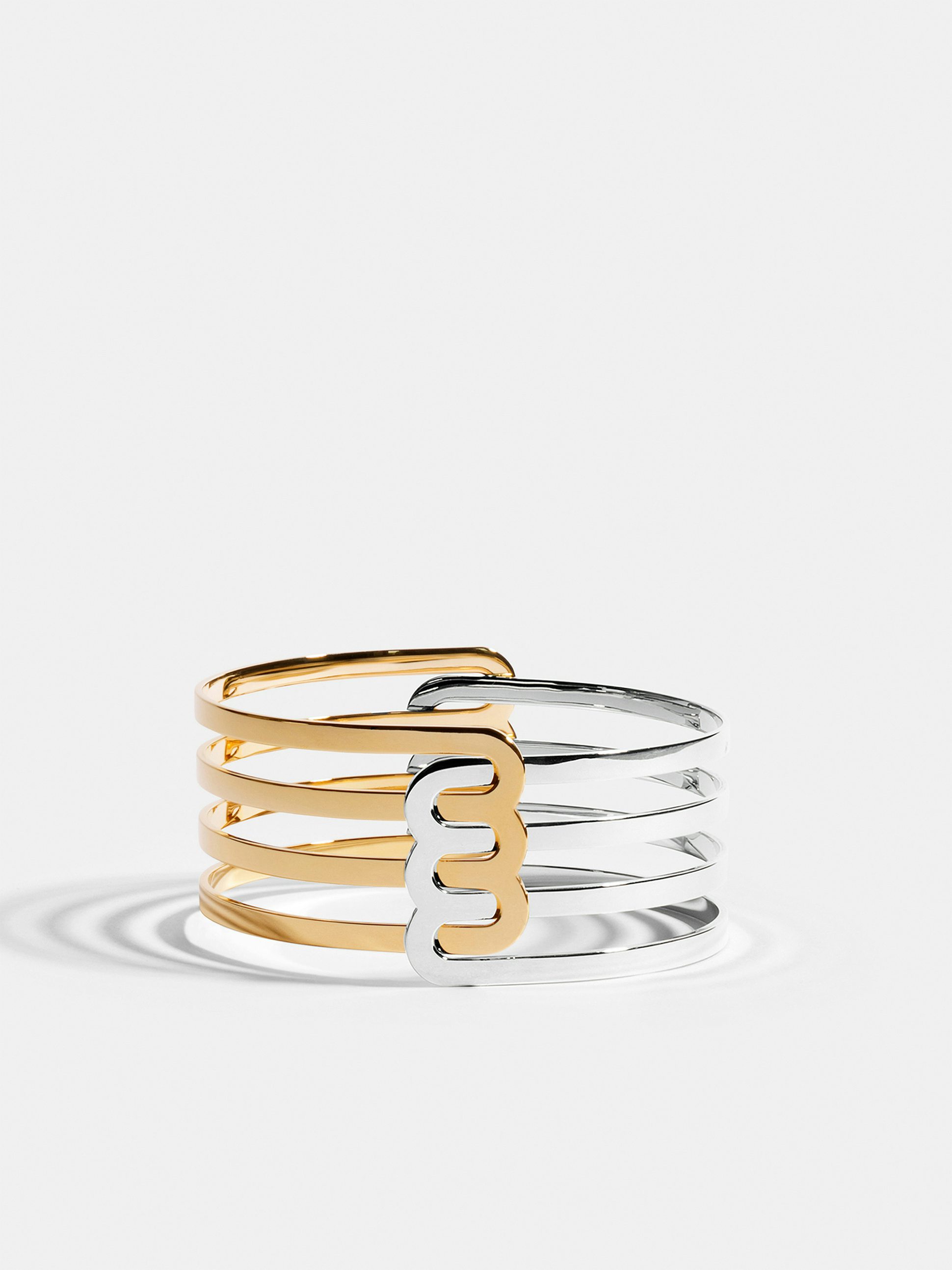 Bracelet Étreintes en Or jaune et blanc éthique 18 carats certifié Fairmined composé de deux demi-bracelets triples finition poli-brillant.