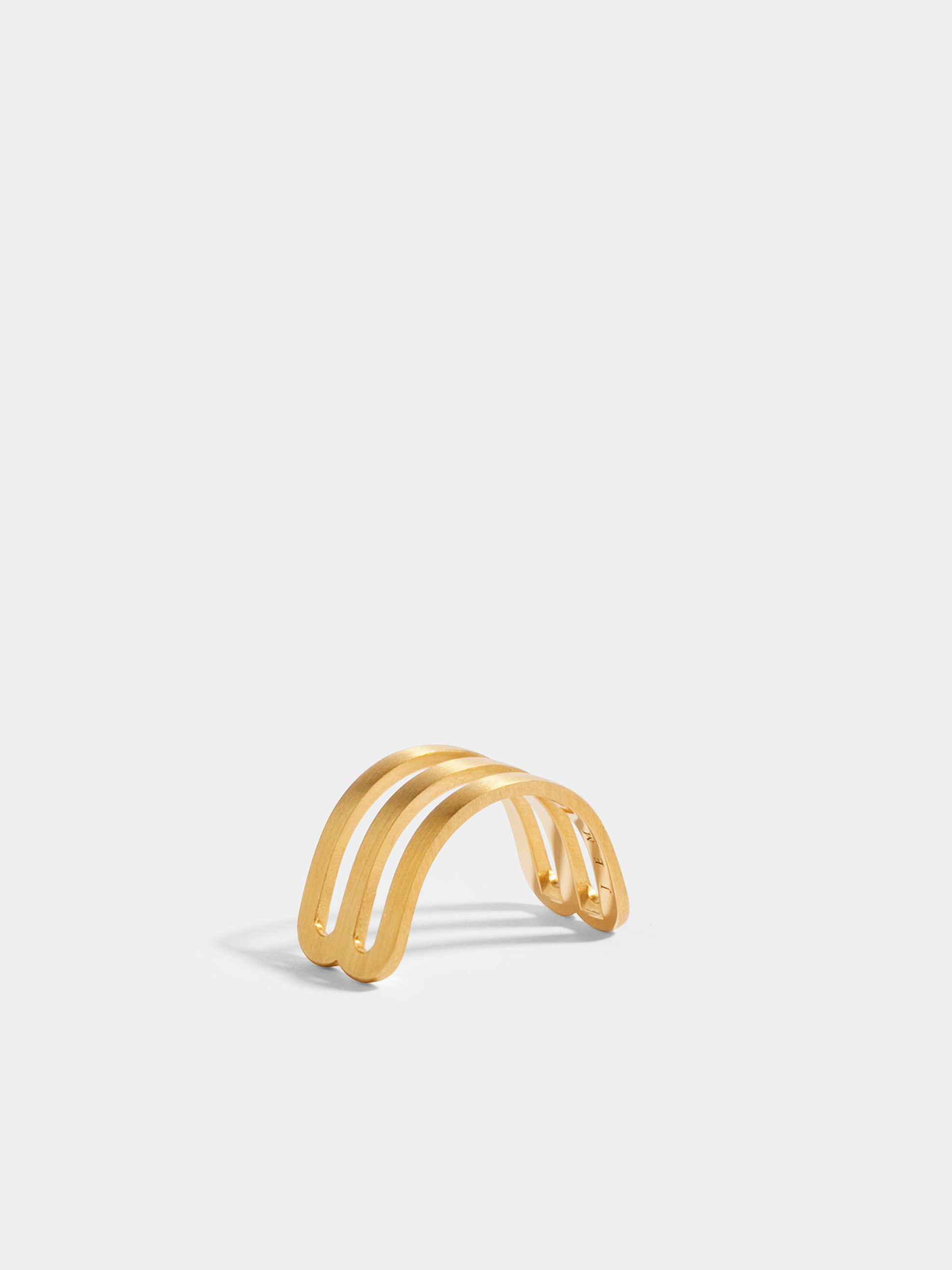 Étreintes double half-ring in 18k Fairmined ethical yellow gold, with brushed finish.