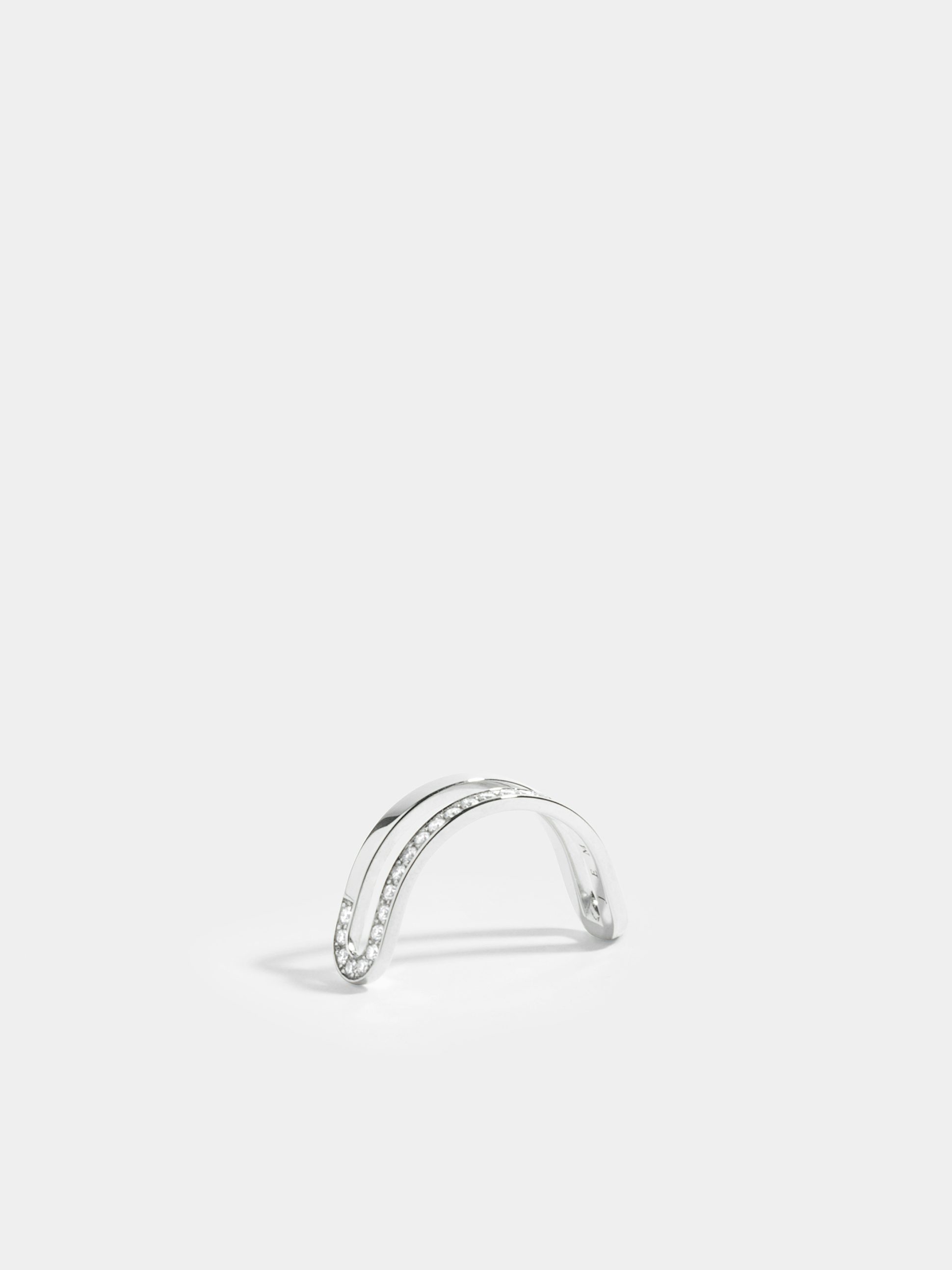 Étreintes simple half-ring in 18k Fairmined ethical white gold, paved with lab-grown diamonds on one line.