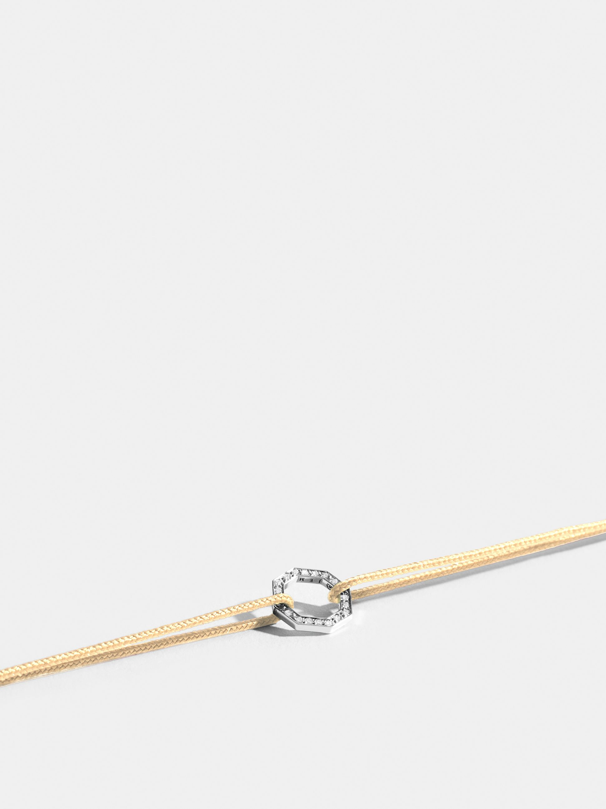 Octogone motif in 18k Fairmined ethical yellow gold, paved with lab-grown diamonds, on a ivory white cord.