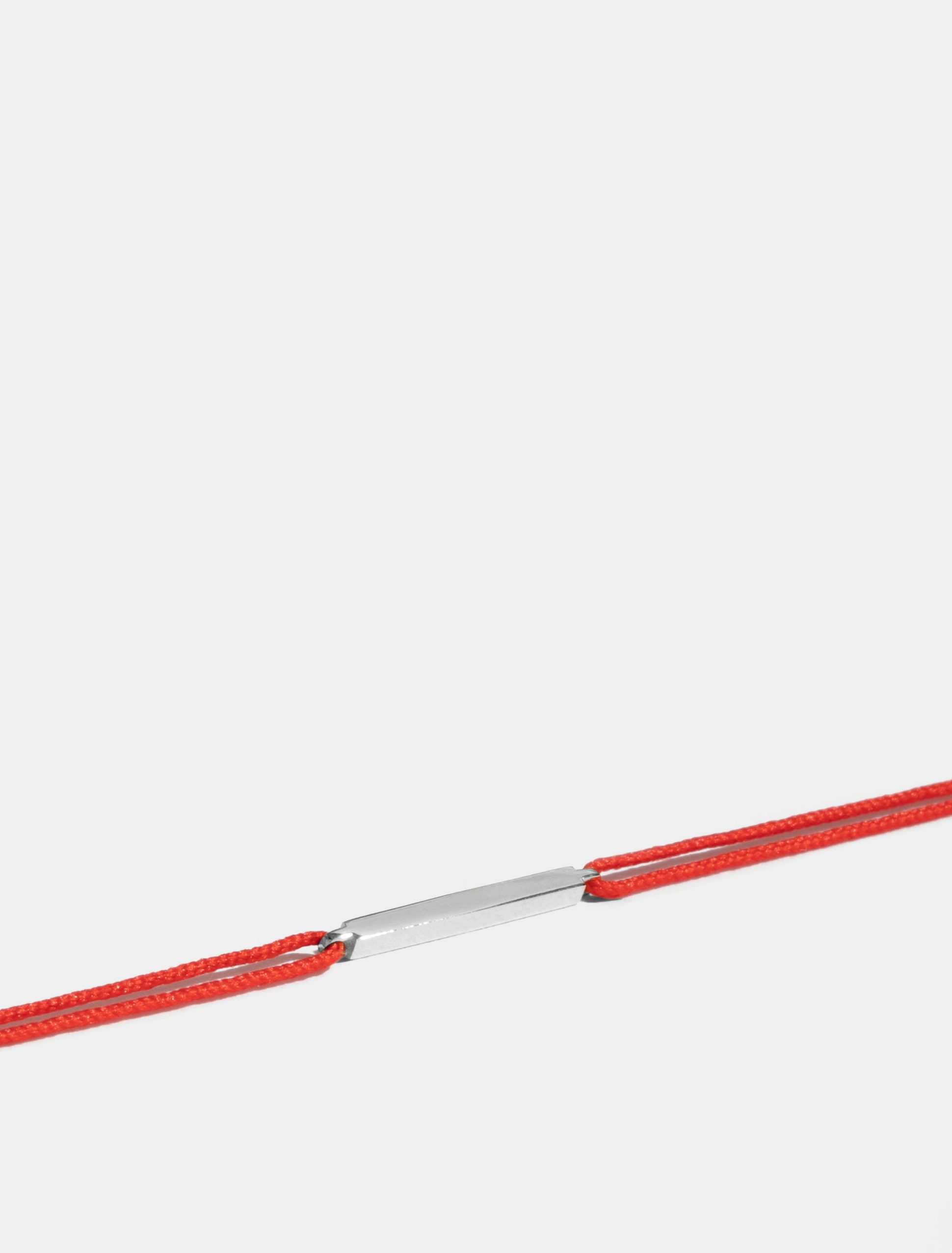 Motif Anagramme poli en Or blanc éthique 18 carats certifié Fairmined, sur cordon